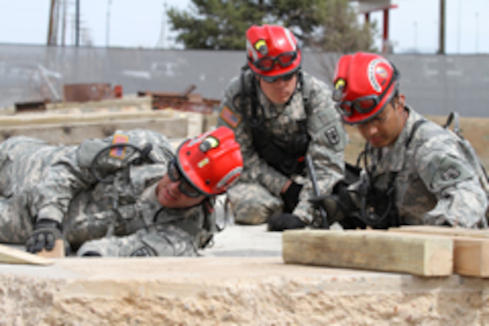 Colorado search and extraction Soldiers assess a rubble pile during a training exerciser April 12-14, 2013, at the West Metro Fire Training Center in Lakewood, Colo., in preparation for this summer’s multi-state National Guard Bureau evaluation. The service members, including Airmen, all trained in chemical, biological, radiological, nuclear and high-yield explosives, represent the state’s CBRNE Enhanced Response Force Package and are held responsible for responding to state emergencies. (Photo by Army National Guard Spc. Zach Sheely/RELEASED)