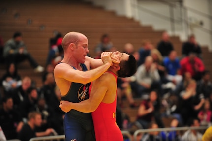 Colorado Army National Guard Soldiers in the World Class Athlete Program compete in Greco-Roman wrestling at the Dave Schultz Memorial International championship at the Olympic Training Center in Colorado Springs, Colo., Jan. 31, 2013. The WCAP provides outstanding Soldier-athletes the support and training required to compete and succeed in national and international competitions leading to Olympic and Paralympic Games, while maintaining a professional military career and promoting the U.S. Army throughout the world. (Army National Guard photo by 2nd Lt. Skye A. Robinson/RELEASED)