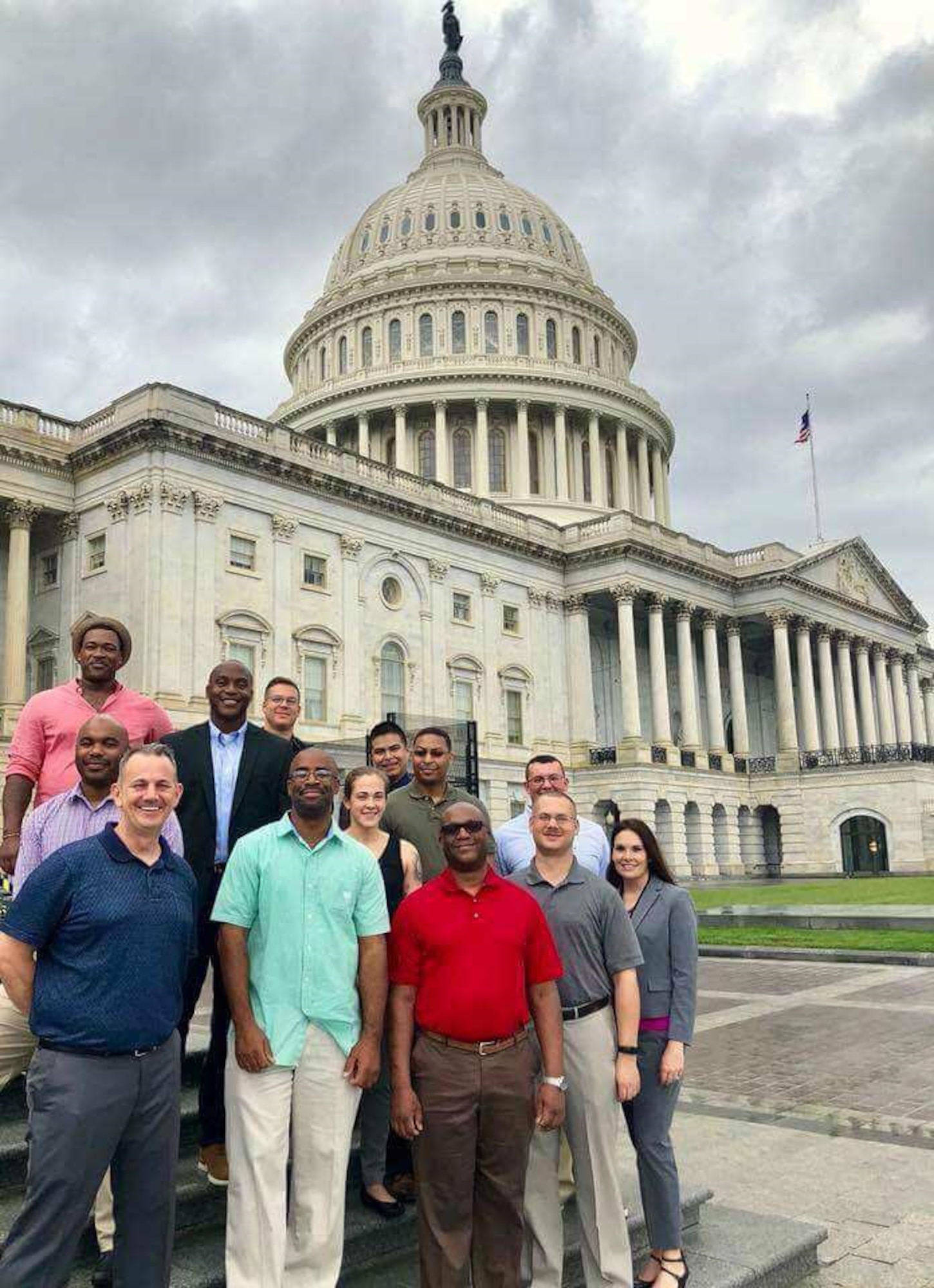 Members of the 6th and 927th Maintenance Squadrons from MacDill Air Force Base, Fla., take a group photo in front of the Capitol Building in Washington D.C., Sept. 17, 2018.