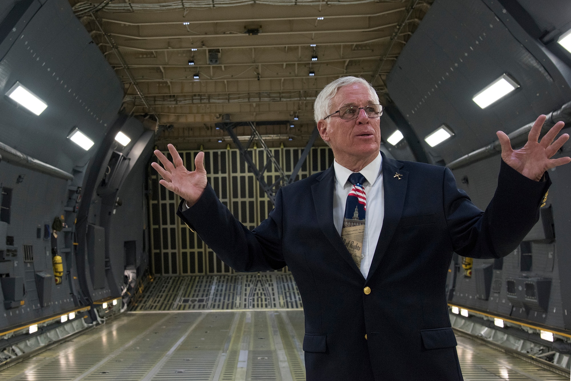 Rich Butler, Air Mobility Command C-5 requirement manager, walks through a C-5M Super Galaxy, Aug. 2, 2018. Butler was on the final flight where the Air Force and Lockheed Martin completed its last C-5M Super Galaxy upgrade on Aug. 6, 2018, a flight that was 18 years in the waiting. (U.S. Air Force photo by Staff Sgt. Julio A. Olivencia Jr.)