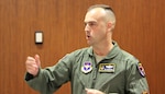 Colorado Air National Guard Col. Edward Vaughan, co-founder of the Guard and Reserve Network, or GARNET, delivers his pitch to the judges Jan. 23, 2013, in a series of 60-second "elevator pitches." GARNET sponsored this first-ever Air University Pitch-Fest, held at the Air War College. Military members and veterans received constructive feedback after pitching their big idea, their qualifications for their next job or any other topic they chose. (U.S. Air Force photo by Scot Talcot/RELEASED