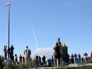 A crowd watches at the Ronald Reagan viewing site at Vandenberg Air Force Base in California as the Missile Defense Agency launches its Ground-based Interceptor Jan. 26, 2013. The Exoatmospheric Kill Vehicle, the payload of a Ground-Based Interceptor, uses the kinetic energy from a direct hit to destroy an incoming target. (Army National Guard photo by Sgt. Benjamin Crane/RELEASED)