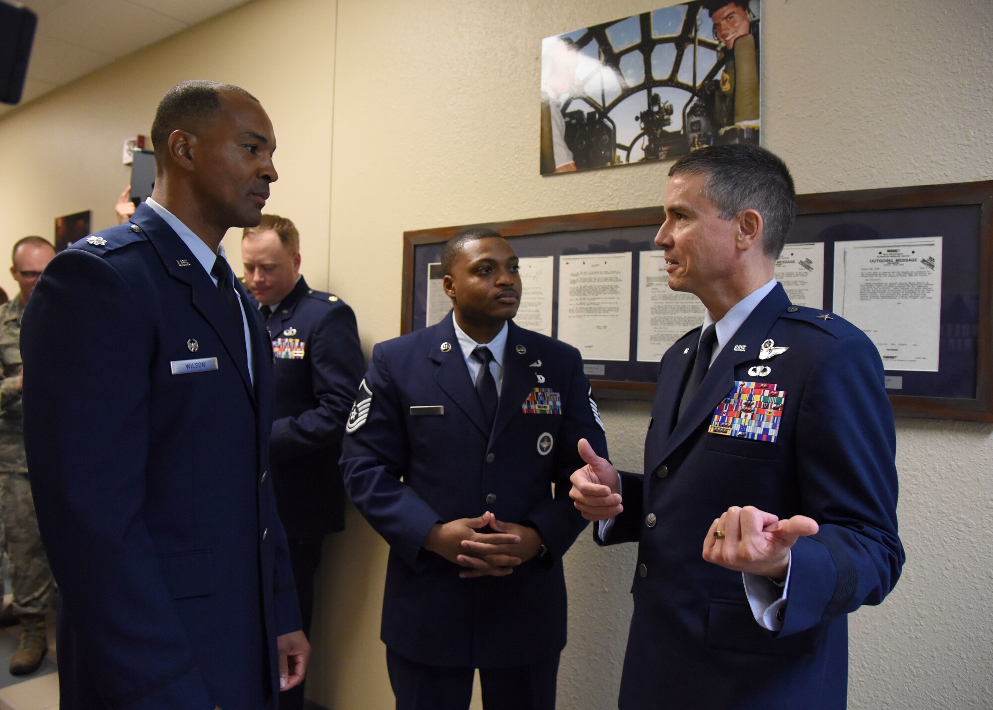 U.S. Air Force Brig. Gen. Paul W. Tibbets IV, Air Force Global Strike Command deputy commander, Barksdale Air Force Base, Louisiana, speaks with Lt. Col. Billy Wilson, 334th Training Squadron commander, during a room dedication ceremony at Cody Hall on Keesler Air Force Base, Mississippi, Sept. 14, 2018. The dedication honored Tibbets' grandfather, retired Brig. Gen. Paul W. Tibbets Jr., by dedicating the 334th Training Squadron Command and Control simulator in his name. Tibbets Jr., piloted the Enola Gay, which dropped the world's first atomic bomb. (U.S. Air Force photo by Kemberly Groue)