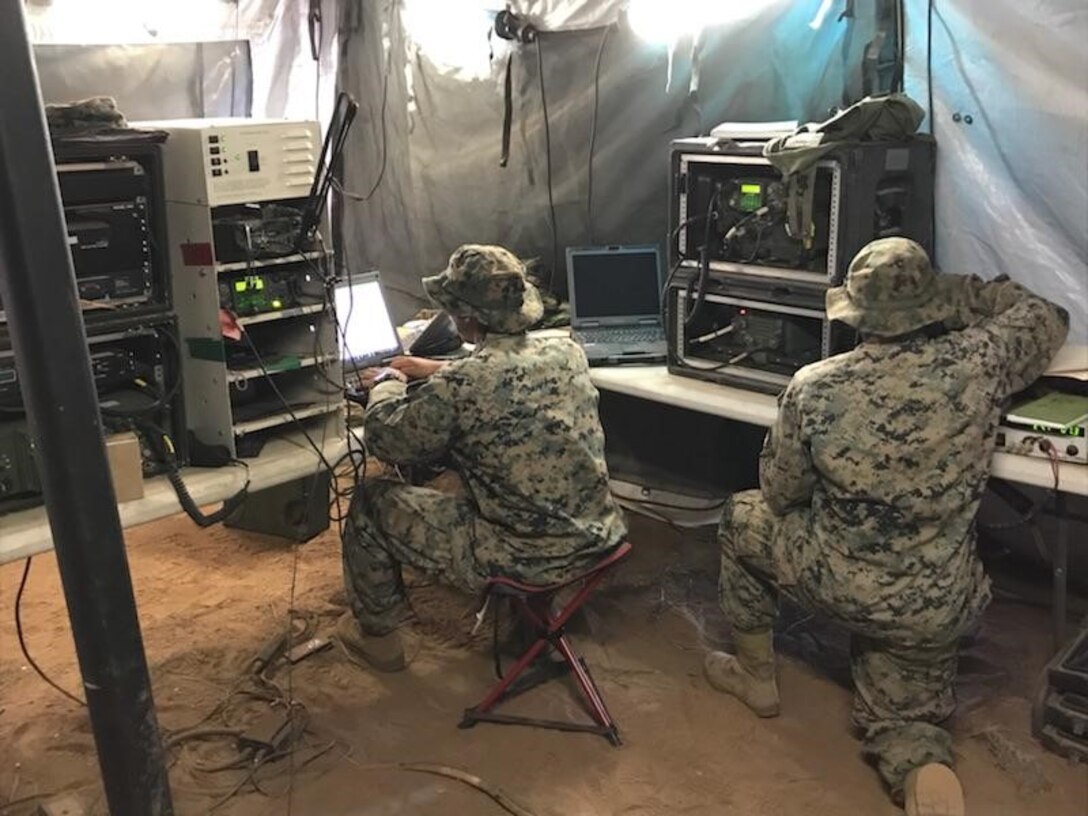 Bravo Company Marines program and monitor single channel and multi-channel communications