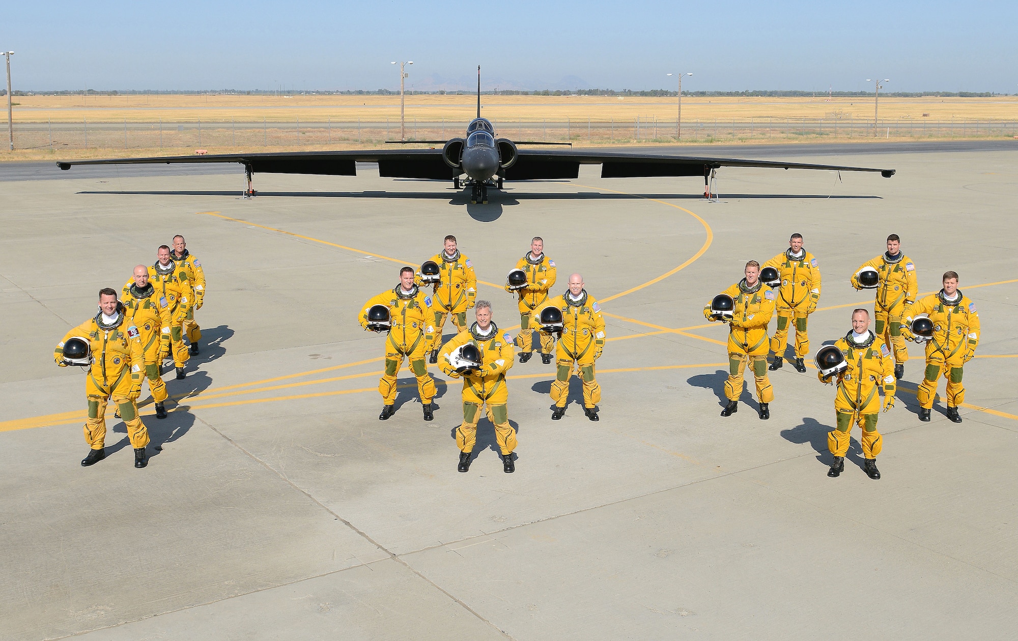 U-2S Dragon Lady Intelligence, Surveillance and Reconnaissance Aircraft instructor pilots from the 1st Reconnaissance Squadron pose for a photo in front of a two seat U-2S August 17, 2012 at Beale Air Force Base, Calif. Less people have piloted the U-2 than have earned Super Bowl rings. (U.S. Air Force photo by Mr. John Schwab)