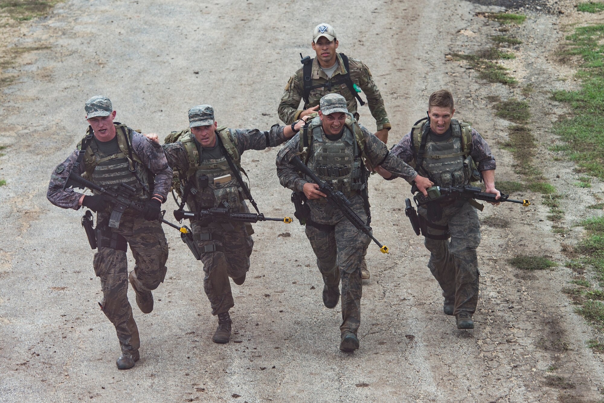 Air Force Materiel Command competitors begin the first day of competition in a dismounted operation competition during Air Force Defender Challenge Sept. 11, 2018 at Joint Base San Antonio-Camp Bullis, Texas. The team captured third place overall at the competition.  (U.S. Air Force Photo By Andrew C. Patterson)