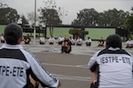 Sgt. Lyndsay Monaco, Not In My Squad (NIMS) workshop facilitator and Brigade S-1 NCO for the National Ground Intelligence Center, conducts physical readiness training with female soldiers of the Peruvian army Sept. 10, 2018, in Lima, Peru. U.S. service members from the WVNG and U.S. Army South worked with the Peruvian Army to facilitate training for non-commissioned officer development, professionalism, ethical behavior, physical fitness, and gender integration for more than 500 PERAR soldiers during a week-long engagement.