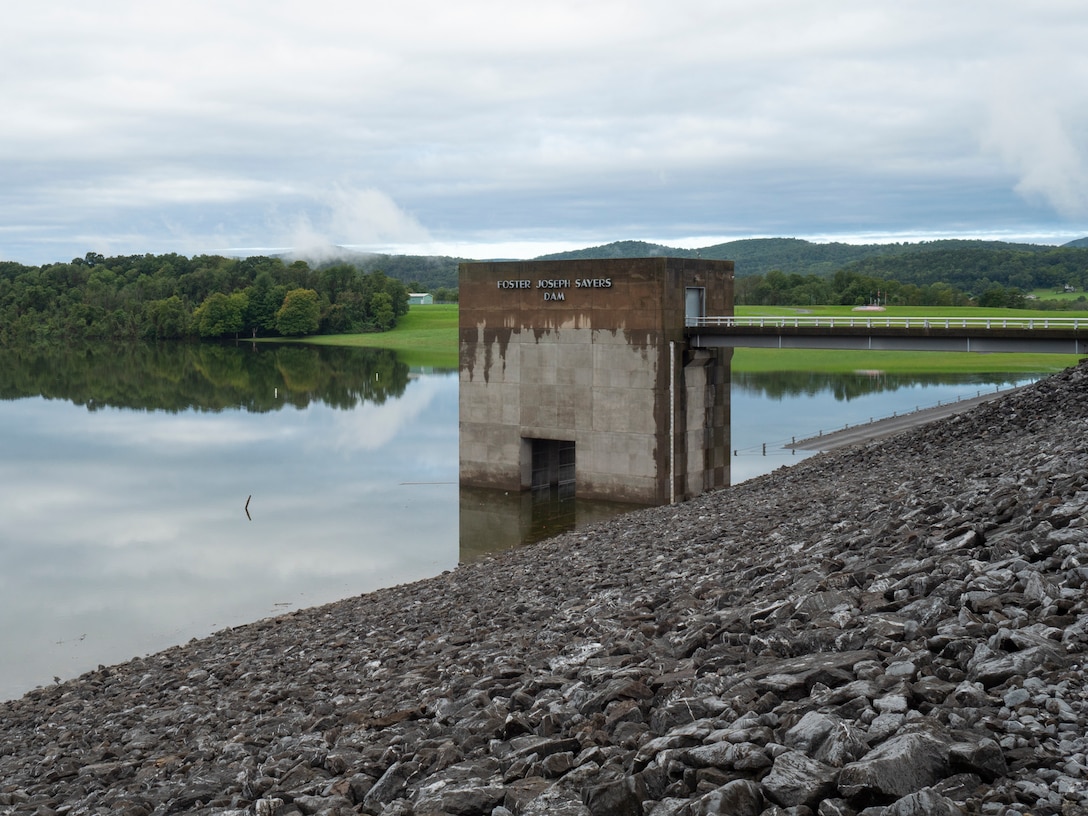 Dam operator, Kirk Wirth, monitors Foster Joseph Sayers Dam after Tropical Depression Florence's rains by measuring the water level, water pressure against the earthen structure, and outflows downstream.