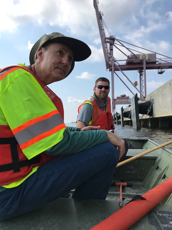 Jason Whittaker, Savannah District structural engineer and Wayne Boeck, Omaha District structural engineer, perform a visual inspection of a wharf on the Military Ocean Terminal Sunny Point, (MOTSU) North Carolina, in support of the installation after landfall of Tropical Cyclone Florence. U.S. Army photo by Russell Wicke