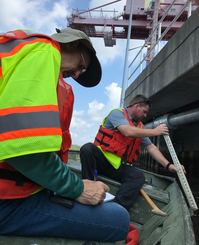 Jason Whittaker, Savannah District structural engineer and Wayne Boeck, Omaha District structural engineer, perform a visual inspection of a wharf on the Military Ocean Terminal Sunny Point, (MOTSU) North Carolina, in support of the installation after landfall of Tropical Cyclone Florence. U.S. Army photo by Russell Wicke