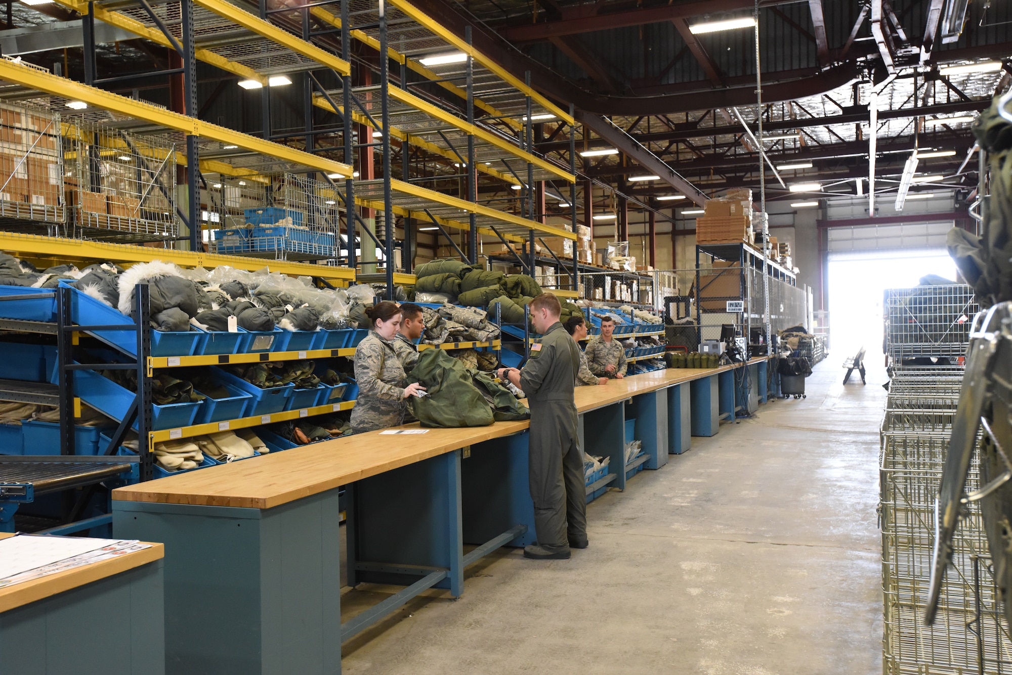 92nd Logistics Readiness Squadron Individual Protective Equipment Airmen help dispense training and deployment gear ready May 2, 2018, at Fairchild Air Force Base, Washington.(U.S. Air Force courtesy photo/Staff Sgt. Samantha Krolikowski)