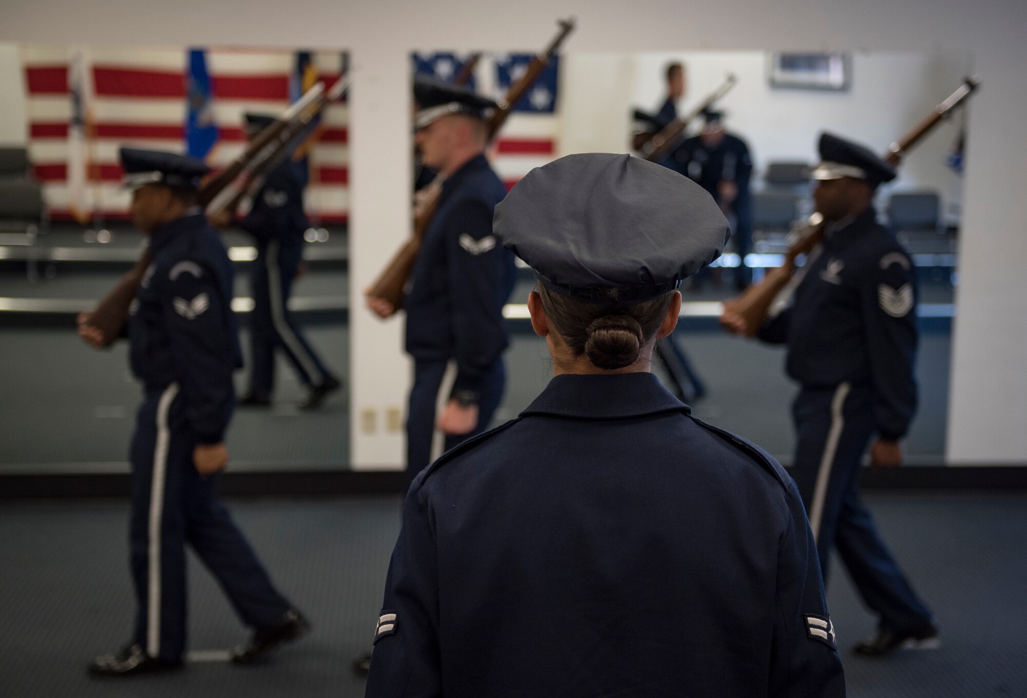 Airman 1st Class Ashely Libbey, Nellis Air Force Base honor guardsman, commands a firing party during practice at Nellis AFB, Nevada, Sept. 13, 2018. Firing parties are just one of many details the team performs. (U.S. Air Force photo by Airman 1st Class Andrew D. Sarver)