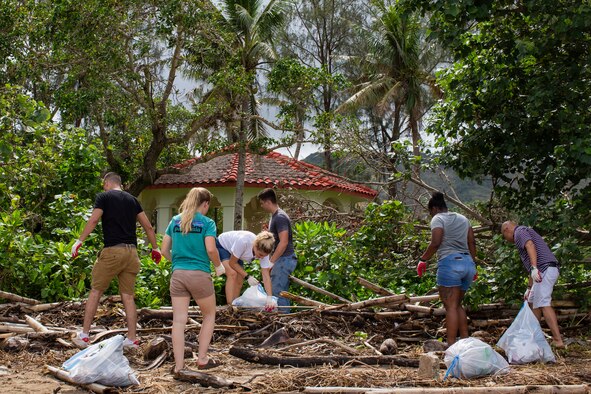 U.S. Marines and sailors with  Marine Aircraft Group (MAG) 12, pick up trash during Exercise Valiant Shield 18 at Agat beach, Guam, Sep. 17, 2018. Valiant Shield is a biennial, U.S. only, field training exercise (FTX) with a focus on integration of joint training among U.S. forces in relation to current operational plans. This training enables real-world proficiency in sustaining joint forces through detecting, locating, tracking and engaging units at sea, in the air, on land, and in cyberspace in response to a range of mission areas.