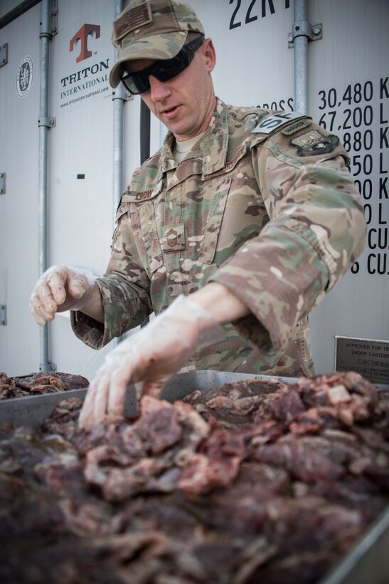U.S. Air Force Chief Master Sergeants as well as senior leadership from the 380th Air Expeditionary Wing gathered to cook a steak feast in celebration for the U.S. Air Forces 71st Birthday at Al Dhafra Air Base, September 18, 2018. (U.S. Air Force photo by Tech. Sgt. Nieko Carzis)