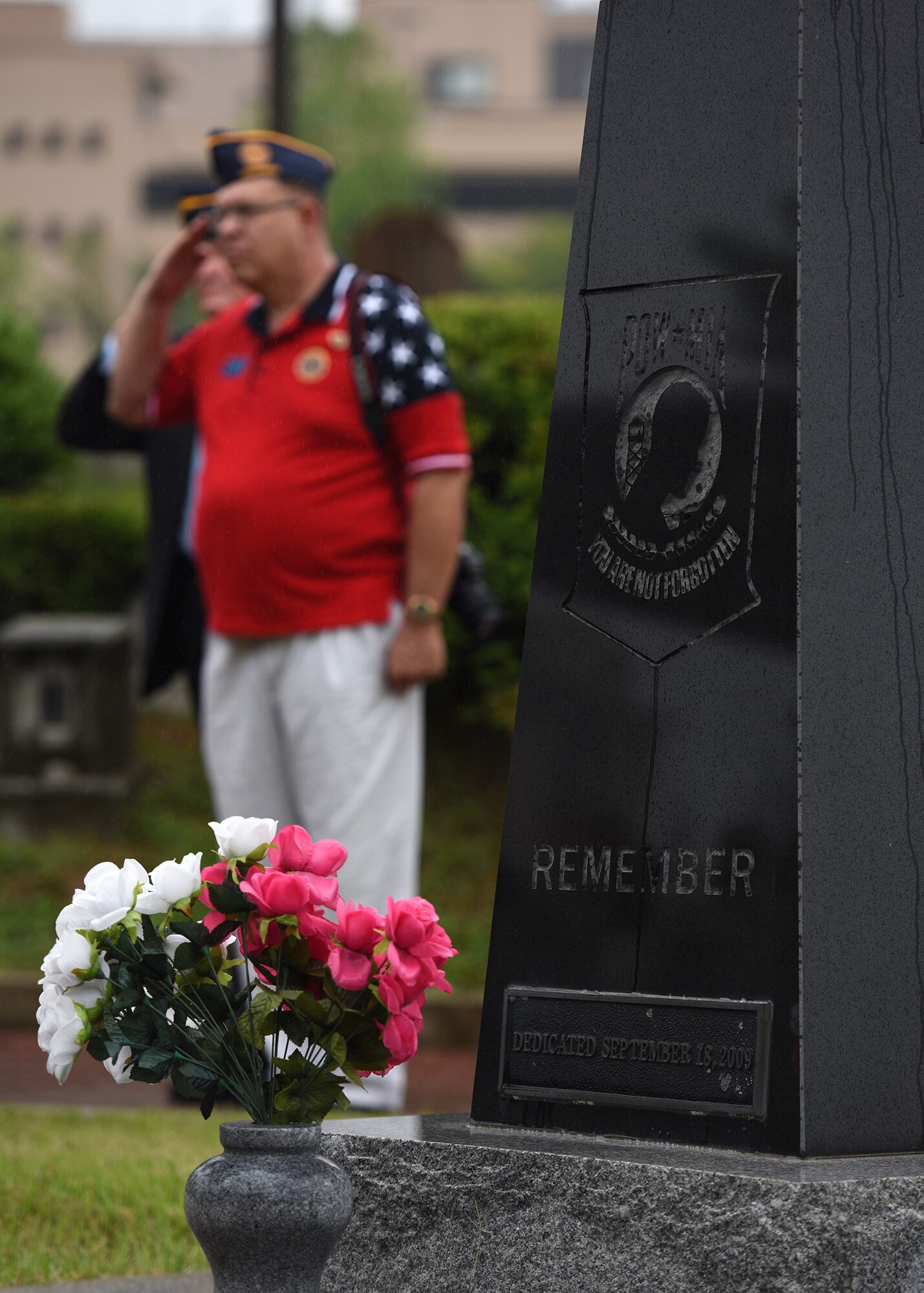 A prisoner of war and missing in action memorial sits outside the base theater at Osan Air Base, Republic of Korea, Sept. 20, 2018. According to the Defense POW/MIA Accounting Agency, more than 82,000 Americans remain missing from WWII, the Korean War, Vietnam War, Cold War, Gulf Wars and other recent conflicts. (U.S. Air Force photo by Staff Sgt. Sergio A. Gamboa)