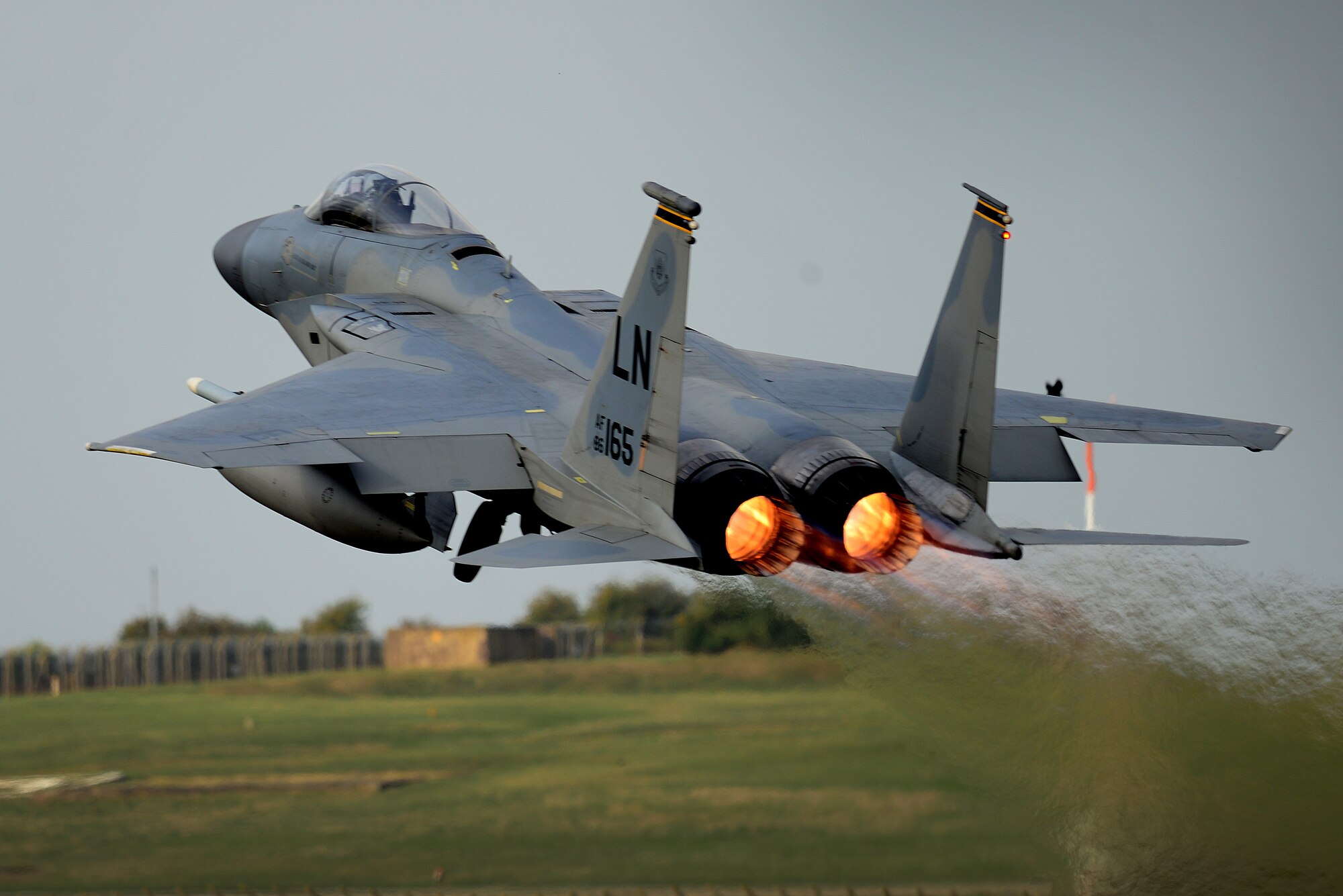 An F-15C Eagle assigned to the 493rd Fighter Squadron launches for a sortie in support of exercise One Sky at Royal Air Force Lakenheath, England Sept. 19, 2018. The bilateral U.S., Poland training event focused on exercising rapid, responsive air operations over Poland in the event of a crisis contingency. Specific operations included defensive counter-air missions designed to improve interoperability and collective self-defense tactics and procedures. (U.S. Air Force photo/ Tech. Sgt. Matthew Plew)
