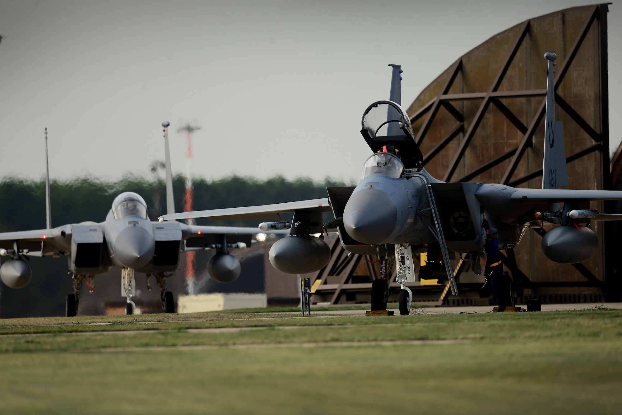 U.S. Airmen assigned to the 493rd Aircraft Maintenance Unit prep F-15C Eagles to support exercise One Sky at Royal Air Force Lakenheath, England Sept. 19, 2018. The bilateral U.S., Poland training event focused on exercising rapid, responsive air operations over Poland in the event of a crisis contingency. Specific operations included defensive counter-air missions designed to improve interoperability and collective self-defense tactics and procedures. (U.S. Air Force photo/ Tech. Sgt. Matthew Plew)