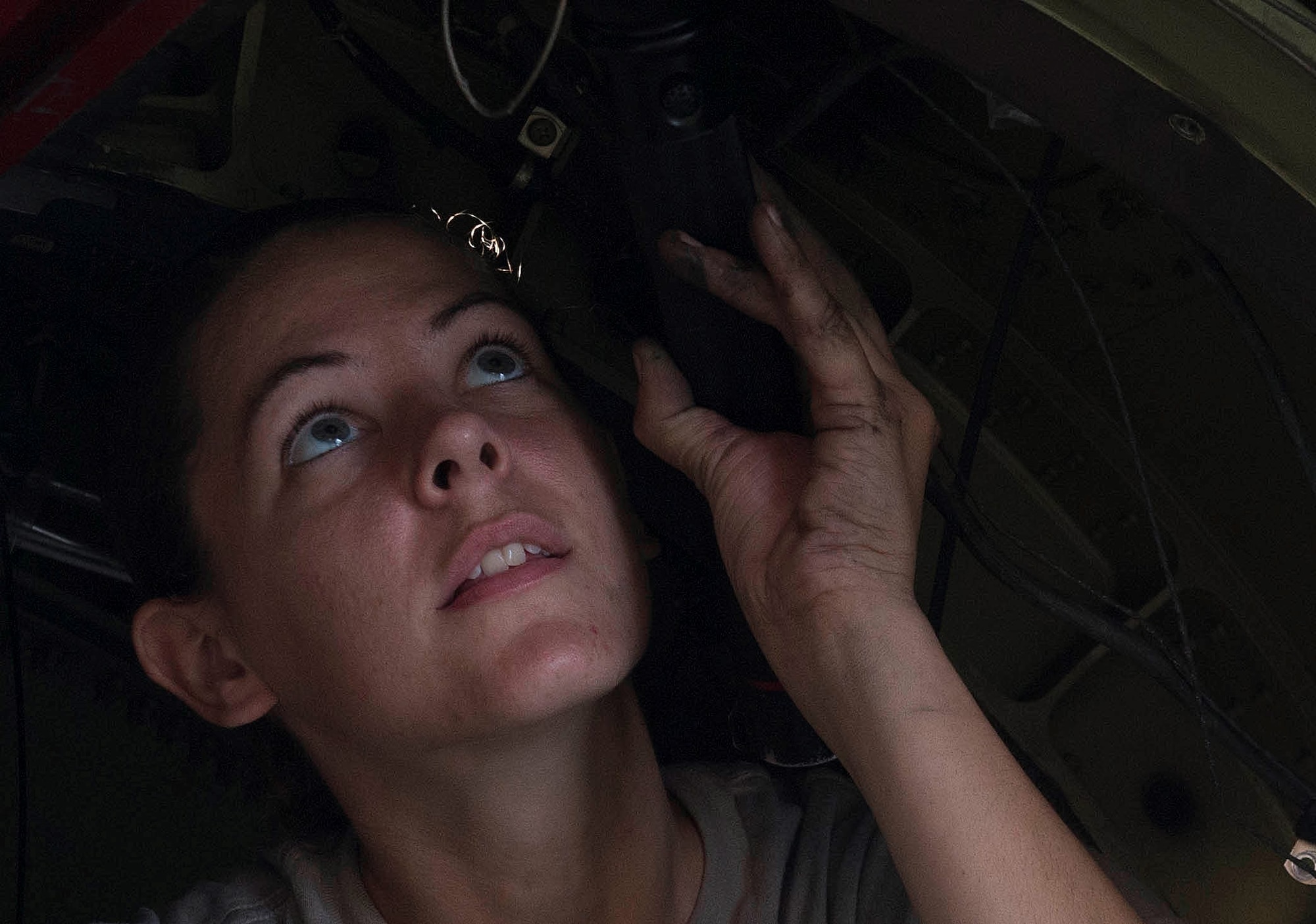 U.S. Air Force Airman 1st Class Krystin Bartelt, 20th Aircraft Maintenance Squadron assistant tactical aircraft maintainer, provides pressure on a bolt at Shaw Air Force Base, S.C., Sept. 6, 2018.