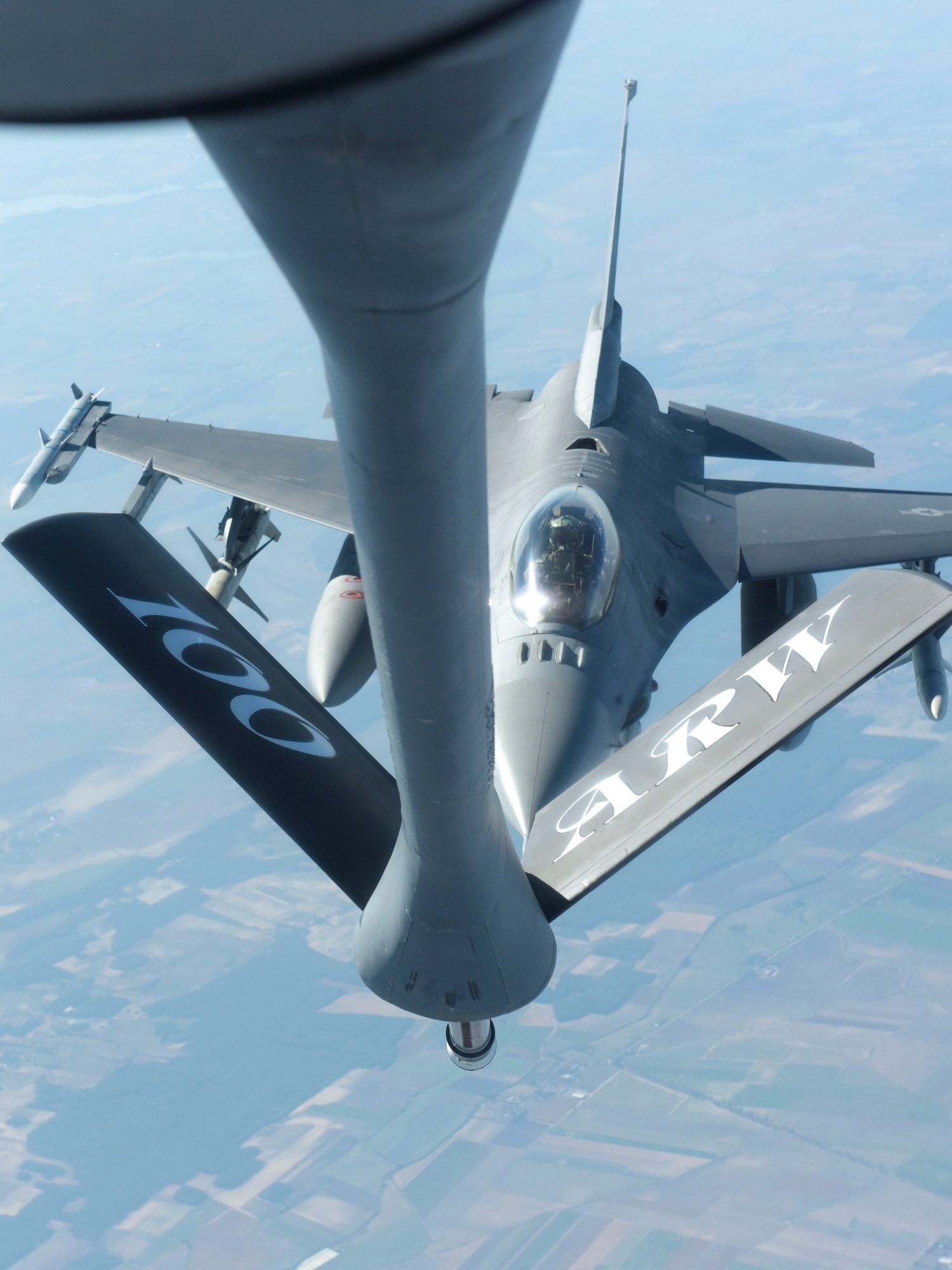 A U.S. Air Force F-16 Fighting Falcons assigned to Spangdahlem Air Base, Germany, approaches a KC-135 Stratotanker from the 100th Air Refueling Wing, in support of exercise One Sky over Poland, Sept. 19, 2018. One Sky is a three-day exercise focusing on testing command and control functions of NATO allies air centers. (U.S. Air Force photo by Airman 1st Class Alexandria Lee)