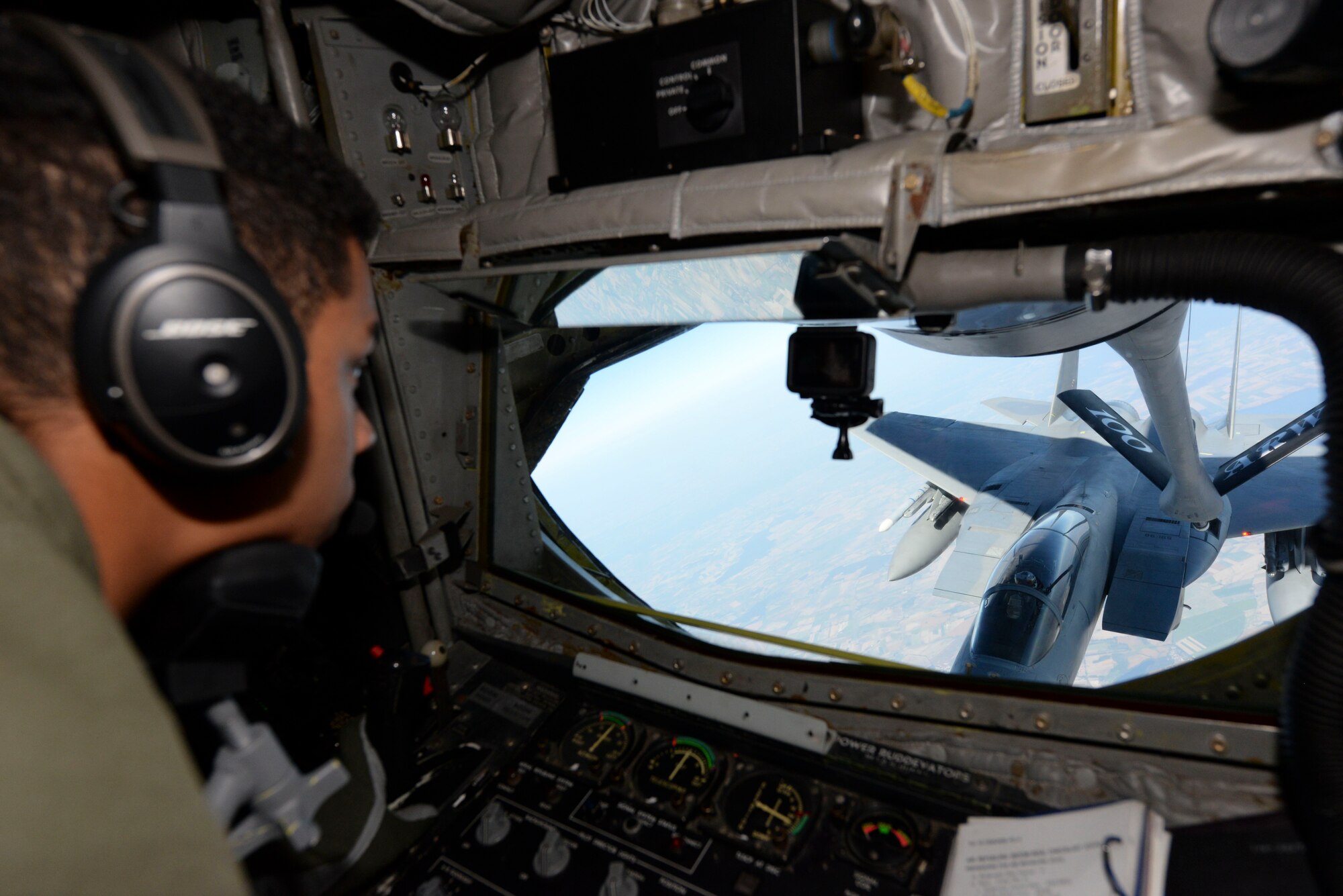 U.S. Air Force Senior Airman Justin Pauleon, 351st Air Refueling Squadron boom operator, refuels a U.S. Air Force F-15C Eagle from RAF Lakenheath, in support of exercise One Sky over Poland, Sept. 19, 2018. The One Sky exercise is an example of U.S. and NATO allies sharing a commitment to promote peace and stability through developing their relationship and communication process. (U.S. Air Force photo by Airman 1st Class Alexandria Lee)