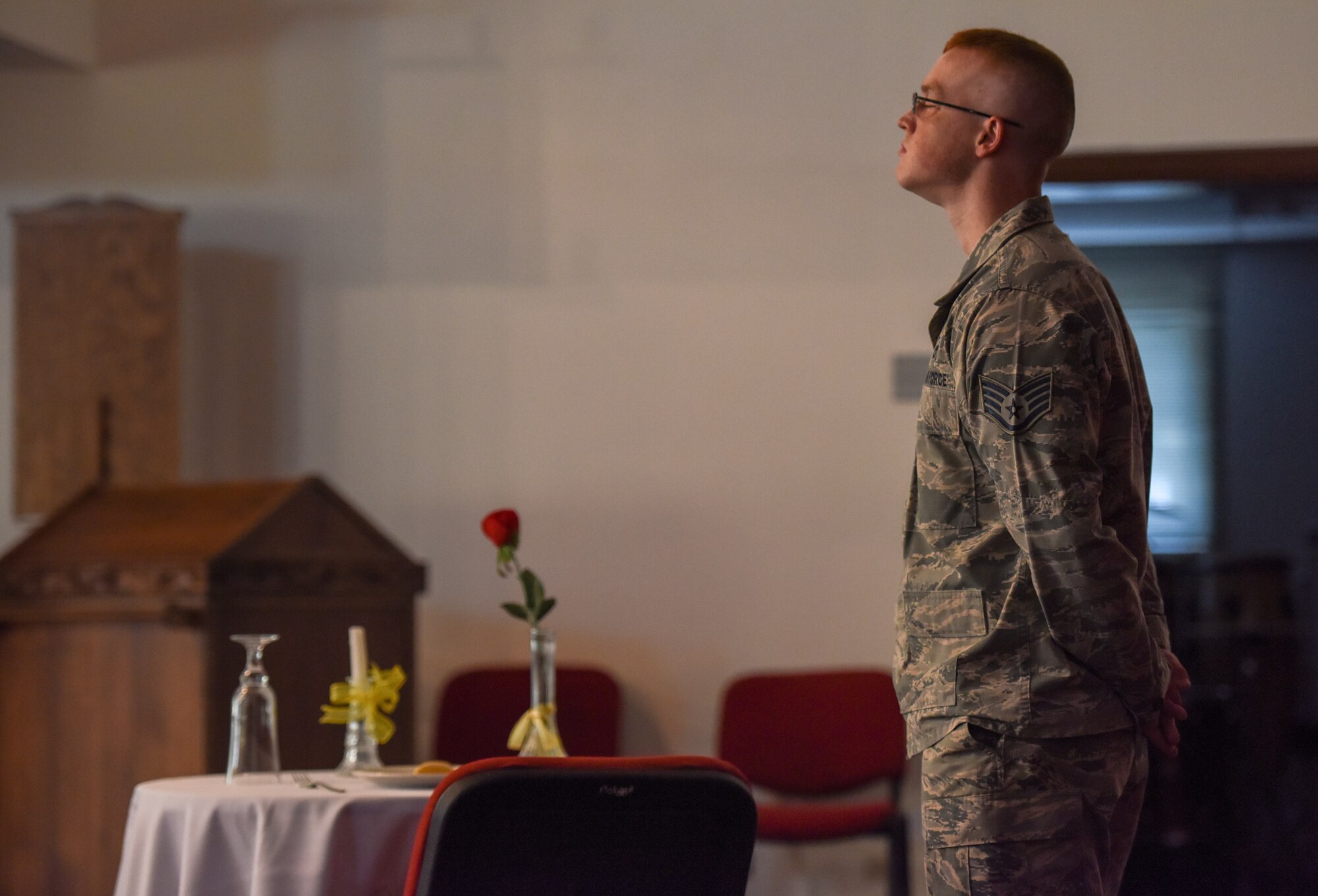 Airman guards the POW/MIA table during the POW/MIA ceremony at Incirlik Air Base, Turkey.