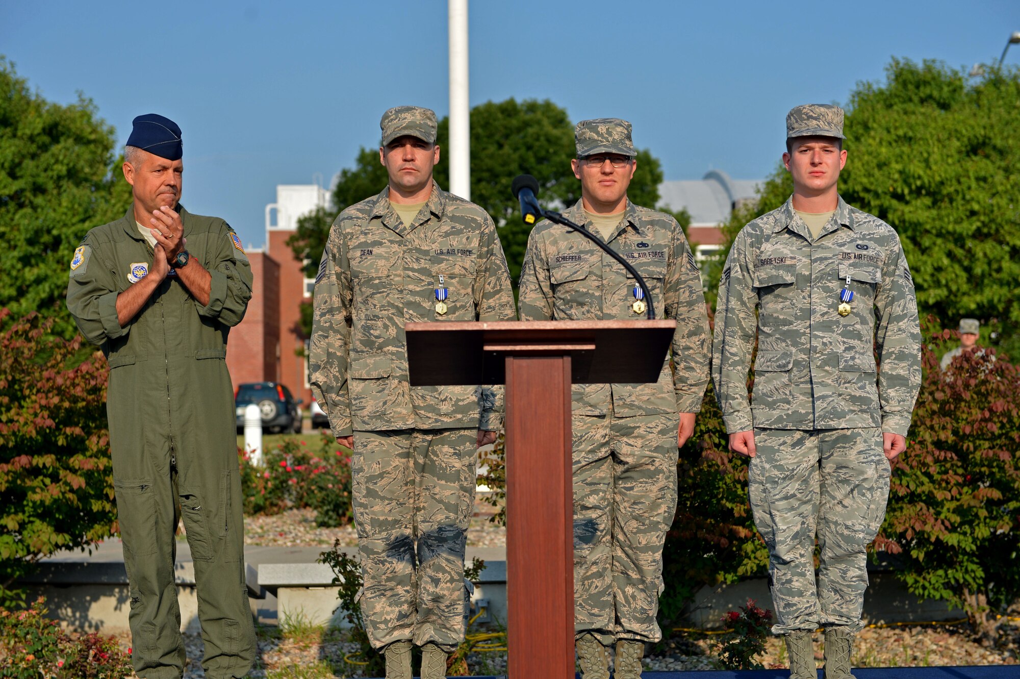 Master Sgt. Jeremy Dean, Staff Sgt. Dan Schieffer, and Senior Airman Jonathan Sobetski receive the Nebraska National Guard Commendation Medal Aug. 5, 2018, at the Nebraska National Guard air base, Lincoln, Nebraska. Capt. John Kupka, the commander of the 155th Logistics Readiness Squadron's distribution flight, and Staff Sgt. Matthew Riley, a traffic management operator with the 155th LRS, were not present for the award ceremony.
 (U.S. Air Force photo taken by Senior Airman Jamie Titus/ Released)