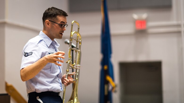 A member of the Gateway Brass, the brass ensemble of the United States Air Force Band of the West, speaks to Bossier Parish students during a Bossier Instructional Center music workshop in Bossier City, La., Sept. 20, 2018. Gateway Brass is a brass quintet with percussion which proudly showcases military professionalism at Department of Defense ceremonies and entertaining public concerts throughout the Gulf Coast region on behalf of the United States Air Force