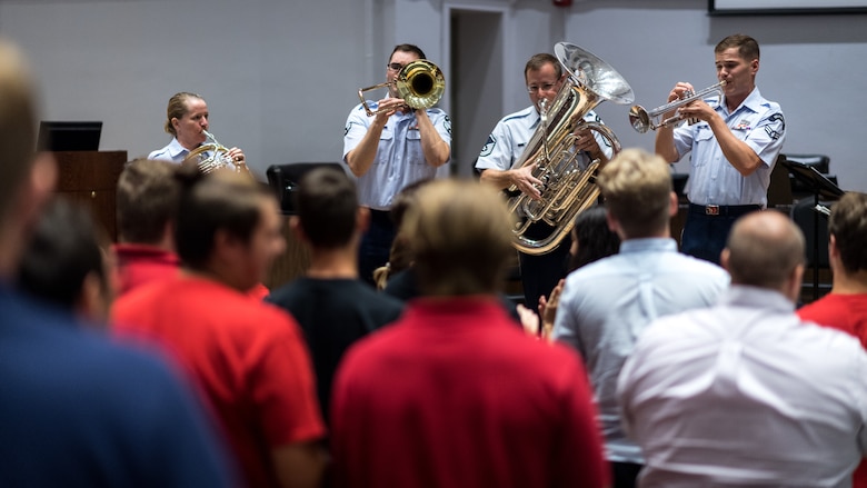 Members of the Gateway Brass, the brass ensemble of the United States Air Force Band of the West, Speaks to Bossier Parish students during a Bossier Instructional Center music workshop in Bossier City, La., Sept. 20, 2018. Gateway Brass is a brass quintet with percussion which proudly showcases military professionalism at DoD ceremonies and entertaining public concerts throughout the Gulf Coast region on behalf of the United States Air Force. This virtuoso group of active duty Airman musicians performs an exciting range of musical styles spanning five centuries