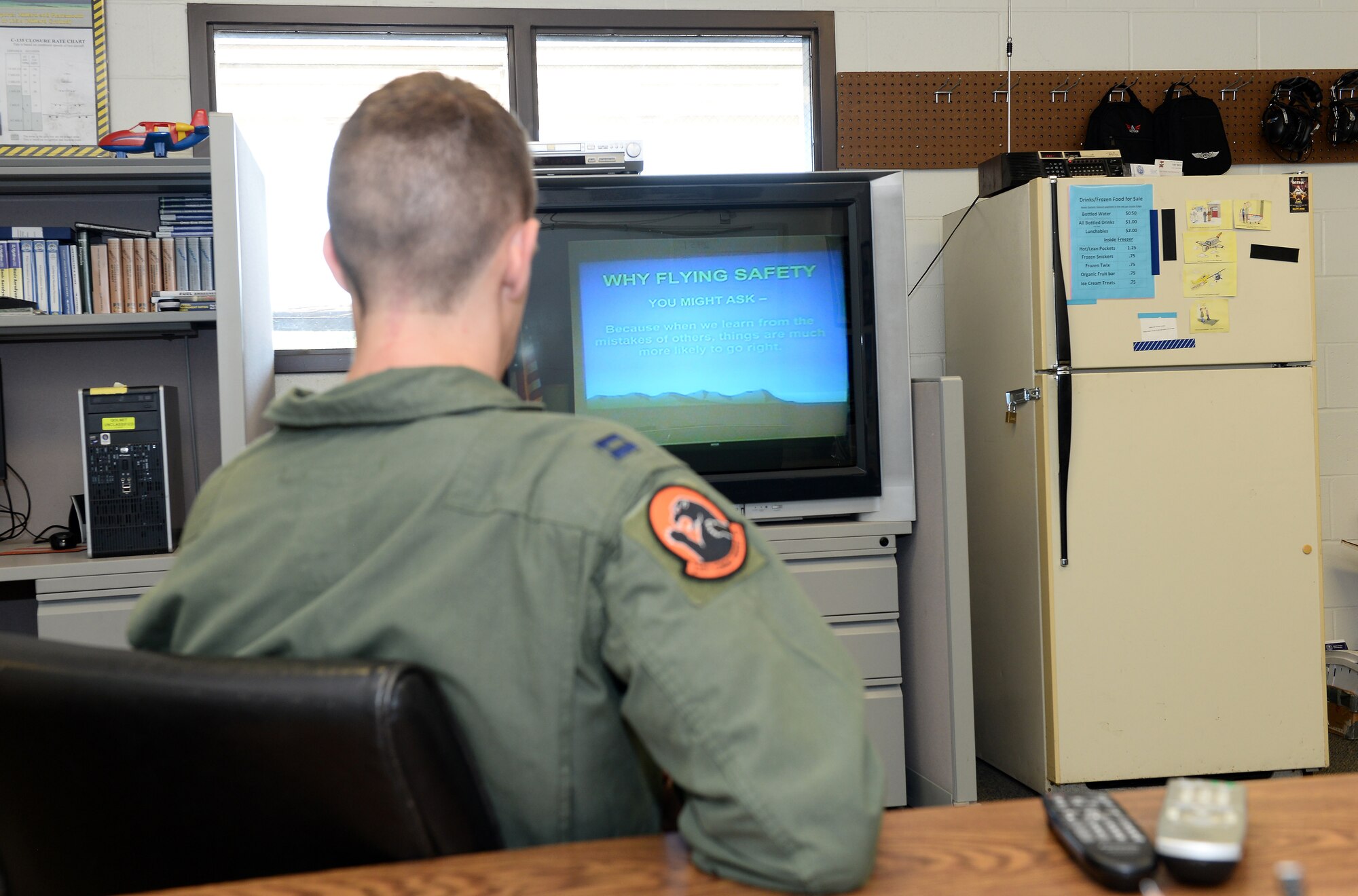U.S. Air Force Capt. Adam Sema, 338th Combat Training Squadron student pilot, watches a safety video Sept. 14, 2018, at the LeMay Aero Club on Offutt Air Force Base, Nebraska. The services of the LeMay Aero Club are available free of charge to active-duty, guard or reserve service members, Department of Defense civilians, Department of Homeland Security personnel, family members of these individuals and retirees. The only exemption to this rule is the family members of retirees. (U.S. Air Force photo by Charles J. Haymond)