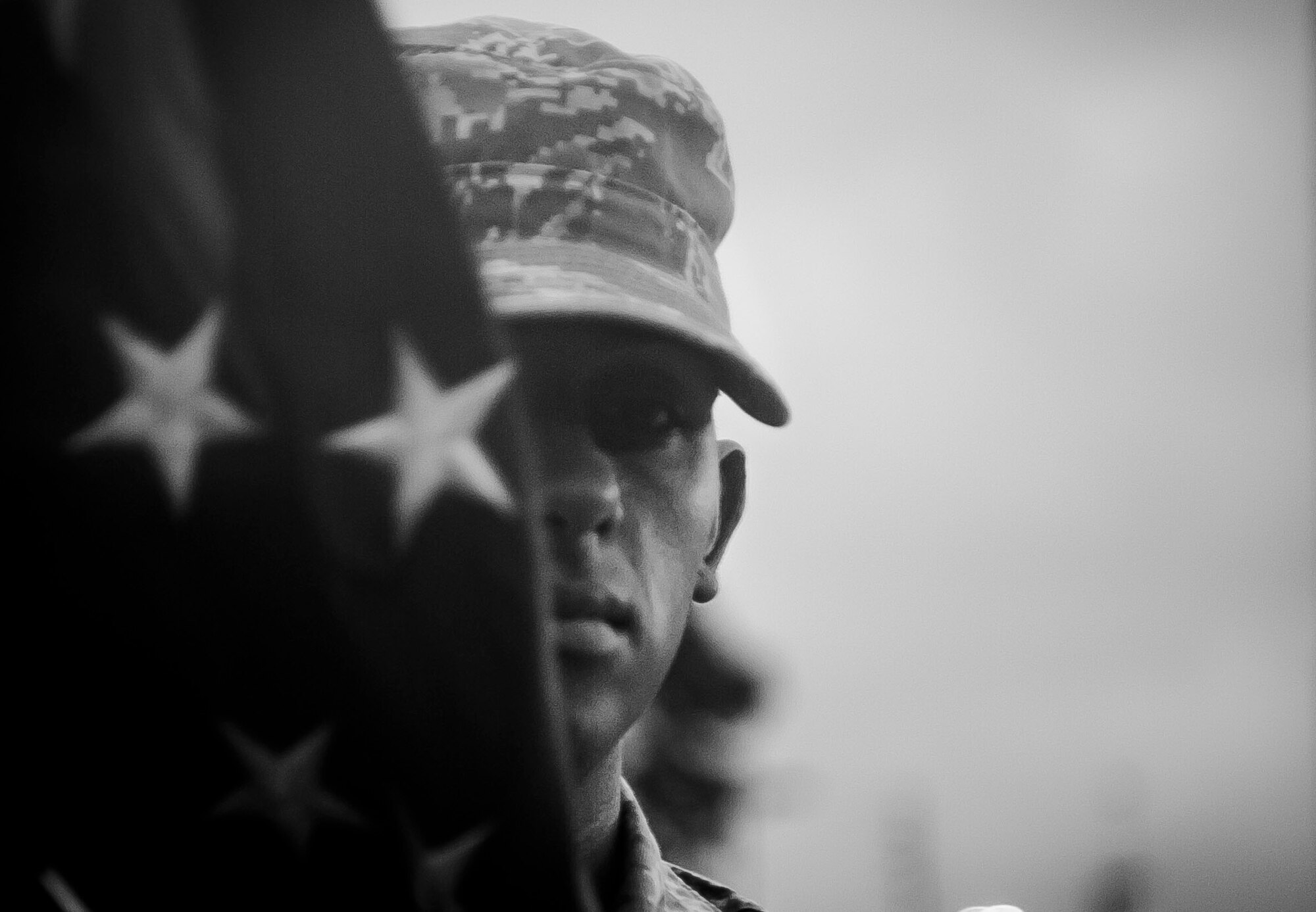 U.S. Air Force Senior Airman James Cuevas, 20th Equipment Maintenance Squadron aircraft structural maintenance journeyman, pays his respects during a reveille ceremony at Shaw Air Force Base, S.C., Sept. 17, 2018.