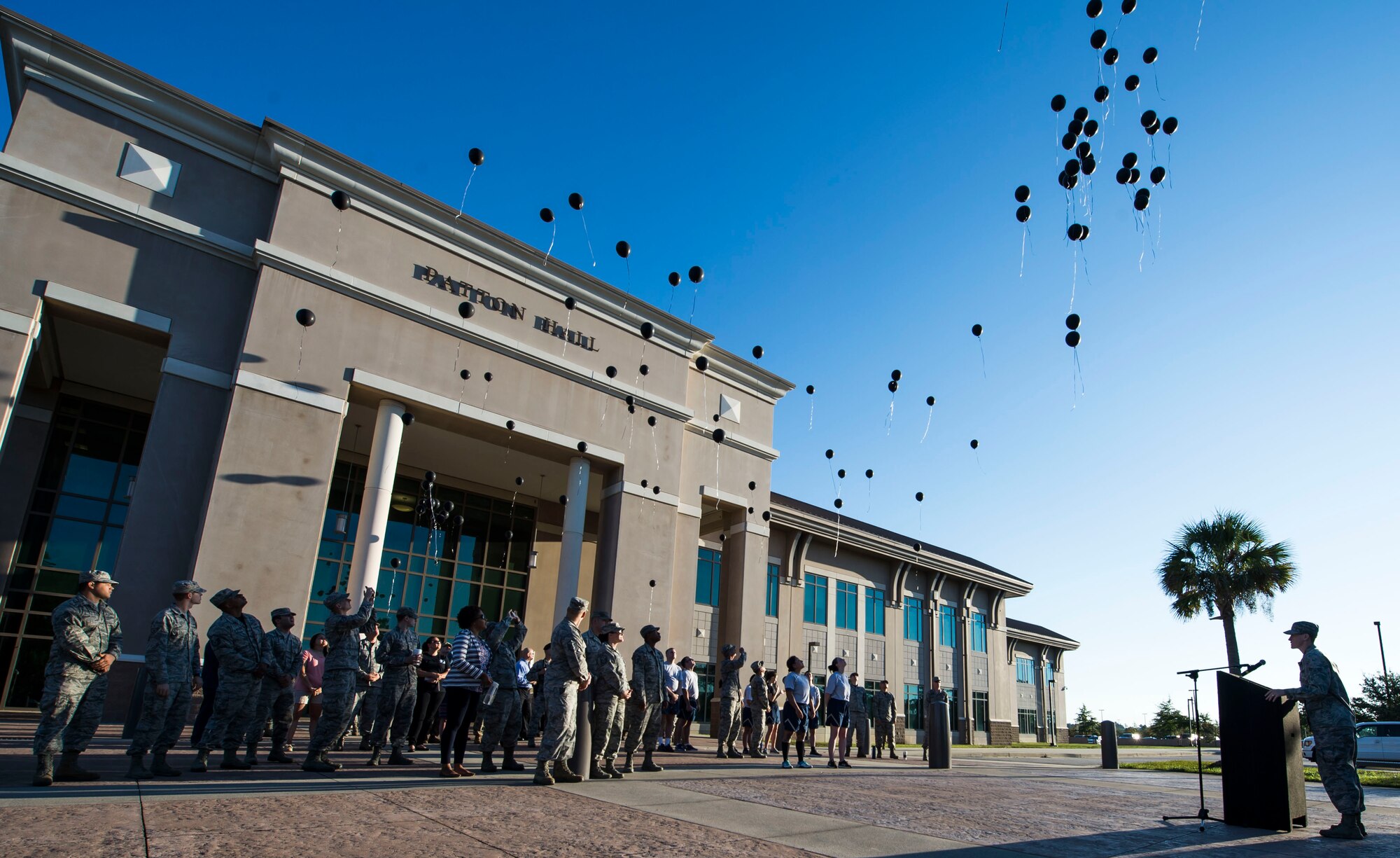 Team Shaw members release balloons following the conclusion of a balloon release ceremony at Shaw Air Force Base, S.C., Sept. 19, 2018.