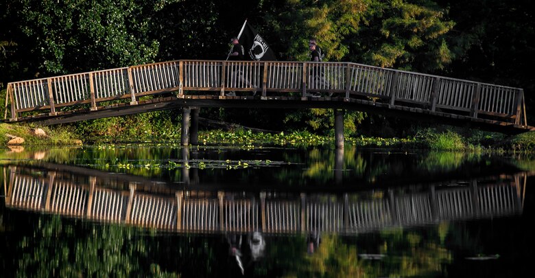 Team Shaw leadership complete the first lap around Memorial Lake during a 24-hour POW/MIA run at Shaw Air Force Base, S.C., Sept. 20, 2018.