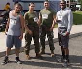 Marines from U.S. Marine Corps Forces Command prepare for  the Marine Corps Community Services 2018 Resource and Health Fair Run/Walk 5K near Naval Support Activity Hampton Roads, Sept. 21. Participants enjoyed food, music, and prizes during the event. Official U.S. Marine Corps photo by Chris Jones/Released)