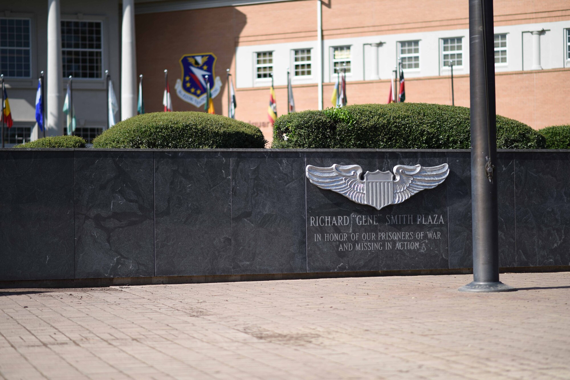 One of the many ways Columbus Air Force Base, Mississippi, remember POWs/MIAs is the Richard “Gene” Smith Plaza. Smith was an F-105 Thunderchief pilot who was shot down Oct. 25, 1967 on a mission to bomb the Paul Doumer Bridge in North Vietnam. He was captured and held for five and a half years before he was released by his captors. (U.S. Air Force photo by Airman 1st Class Beaux Hebert)