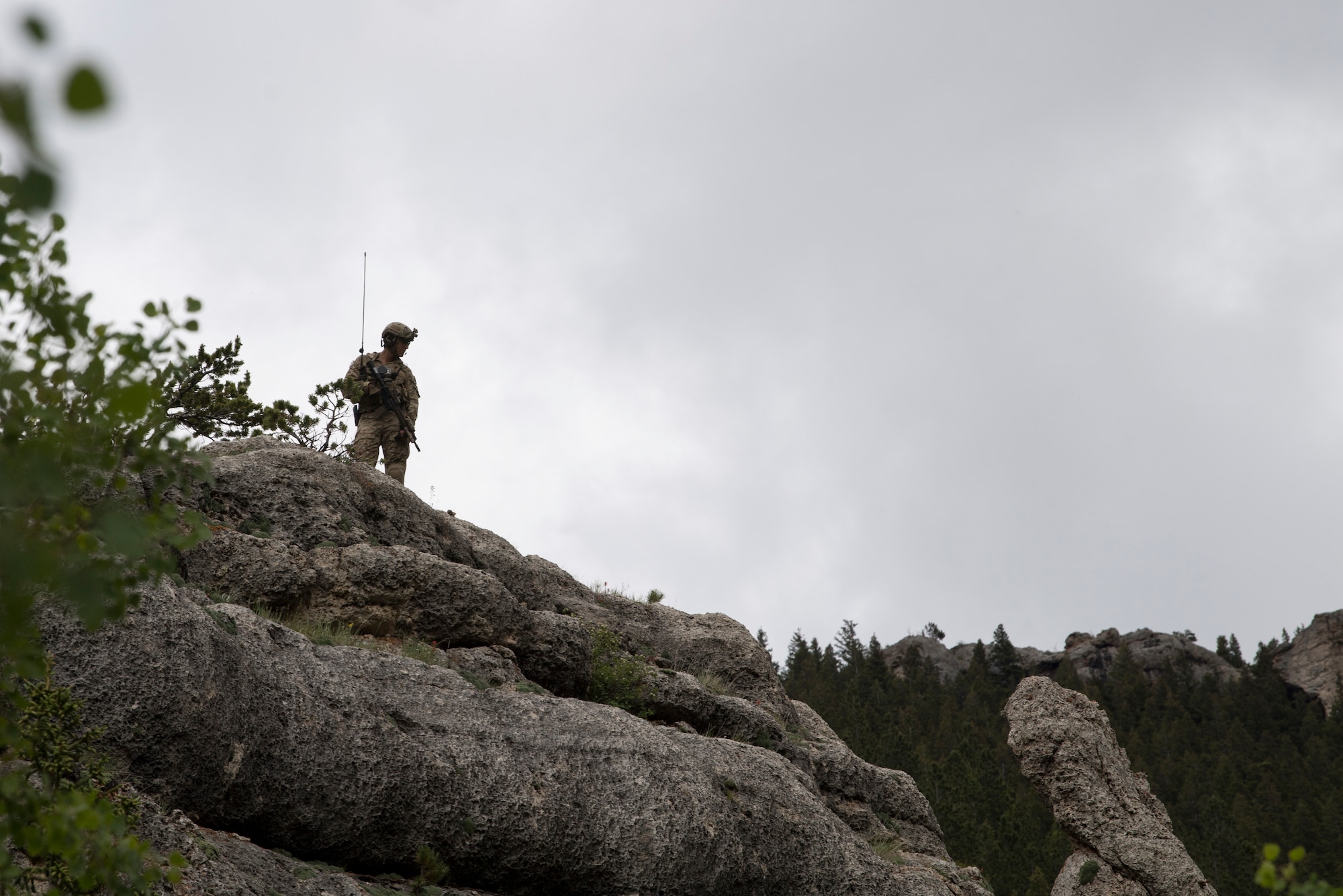 A Special Tactics Airman with the 26th Special Tactics Squadron scans the horizon at Crow Indian Reservation, Montana, June 20, 2018.