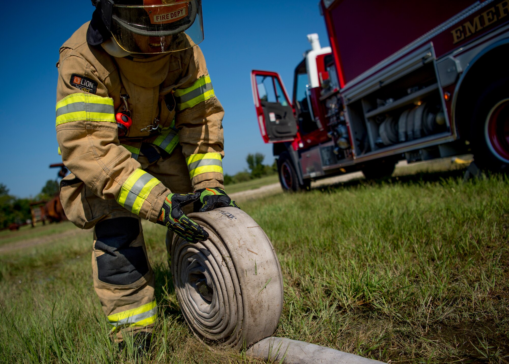 U.S. Air Force Airman 1st Class Christian Paulson, 633rd Civil Engineer Squadron firefighter, participates in a live-fire training exercise at Joint Base Langley-Eustis, Virginia, Sept. 19, 2018.