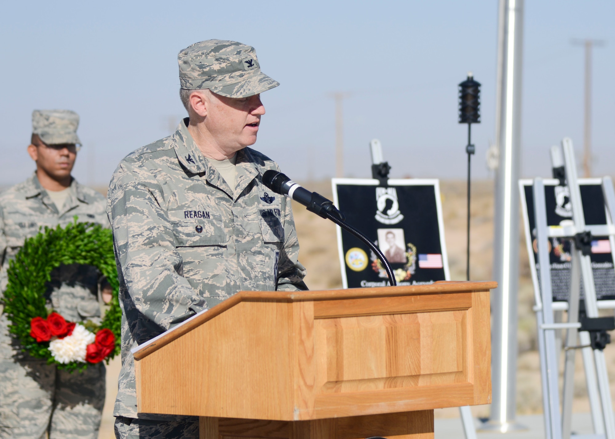 Col. Kirk Reagan, Vice Commander, 412th Test Wing, addresses those in attendance at a wreath-laying ceremony commemorating National POW/MIA Recognition Day at the Airman Leadership School Drill Pad at Edwards Air Force Base, California, Sept. 21. (U.S. Air Force photo by Giancarlo Casem)