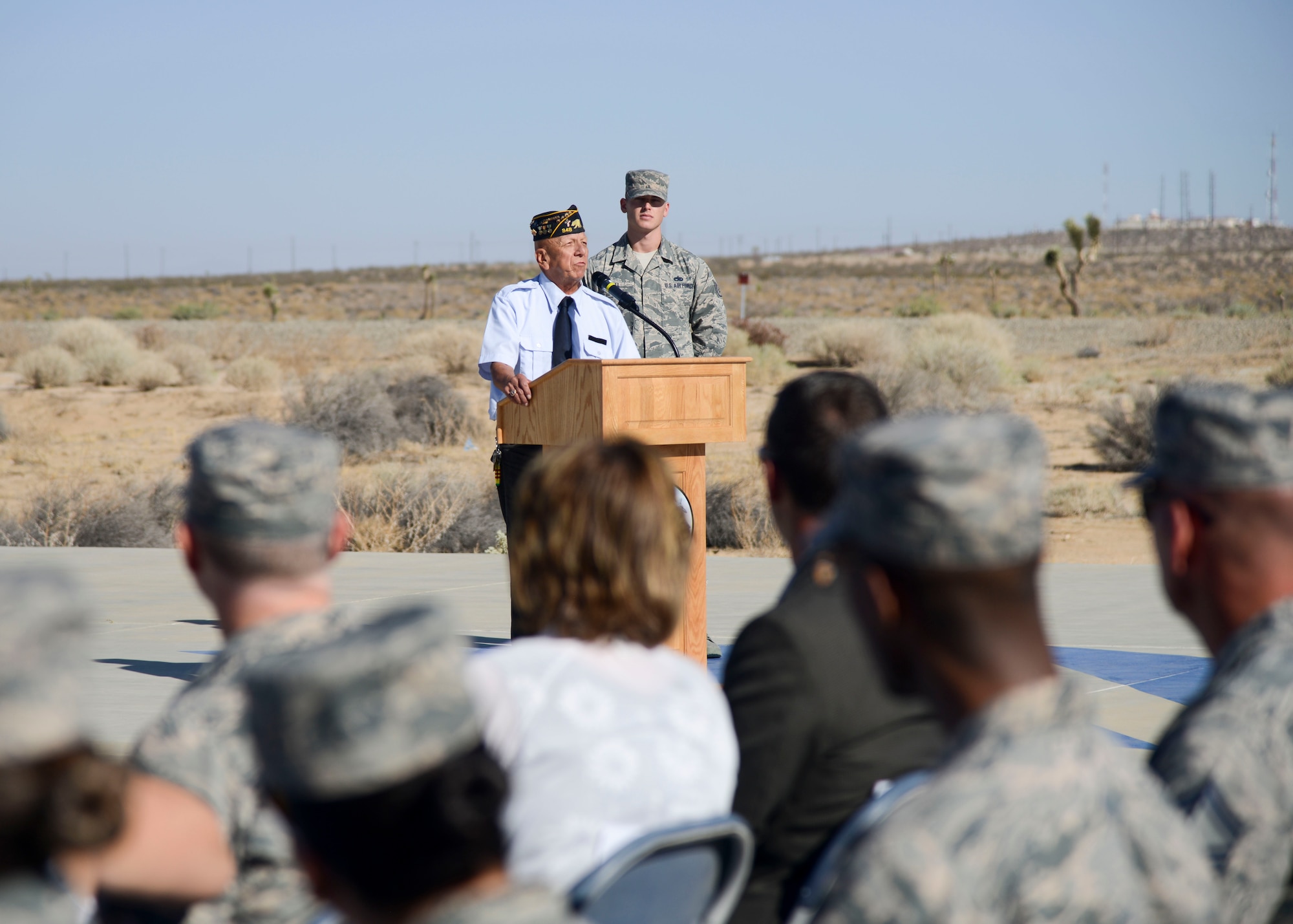 Carl Hernandez, Commander, American Legion Post 348 of Palmdale, California, gives a speech about POW/MIAs during a wreath-laying ceremony commemorating National POW/MIA Recognition Day at the Airman Leadership School Drill Pad at Edwards Air Force Base, California, Sept. 21. (U.S. Air Force photo by Giancarlo Casem)