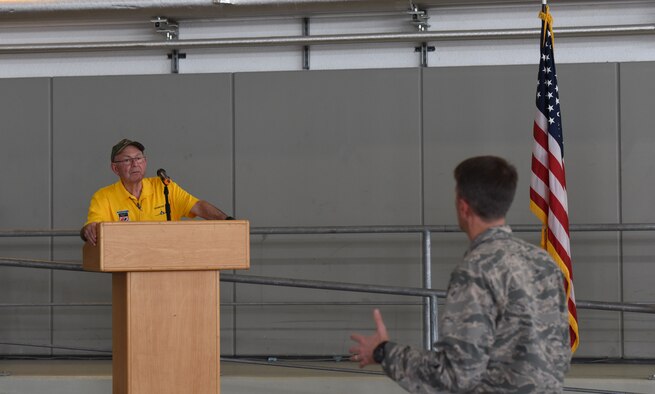 U.S. Air Force Col. Brad Spears, 521st Air Mobility Operations Wing commander, asks retired U.S. Air Force Maj. Joe Crecca a question about his experience as a prisoner or war during a speaking session on Ramstein Air Base, Germany, Sept. 17, 2018. After 75 successful combat missions, Crecca was shot down by enemy fire while flying his F-4 aircraft over North Vietnam. (U.S. Air Force photo by Airman 1st Class Kristoff Rixmann)