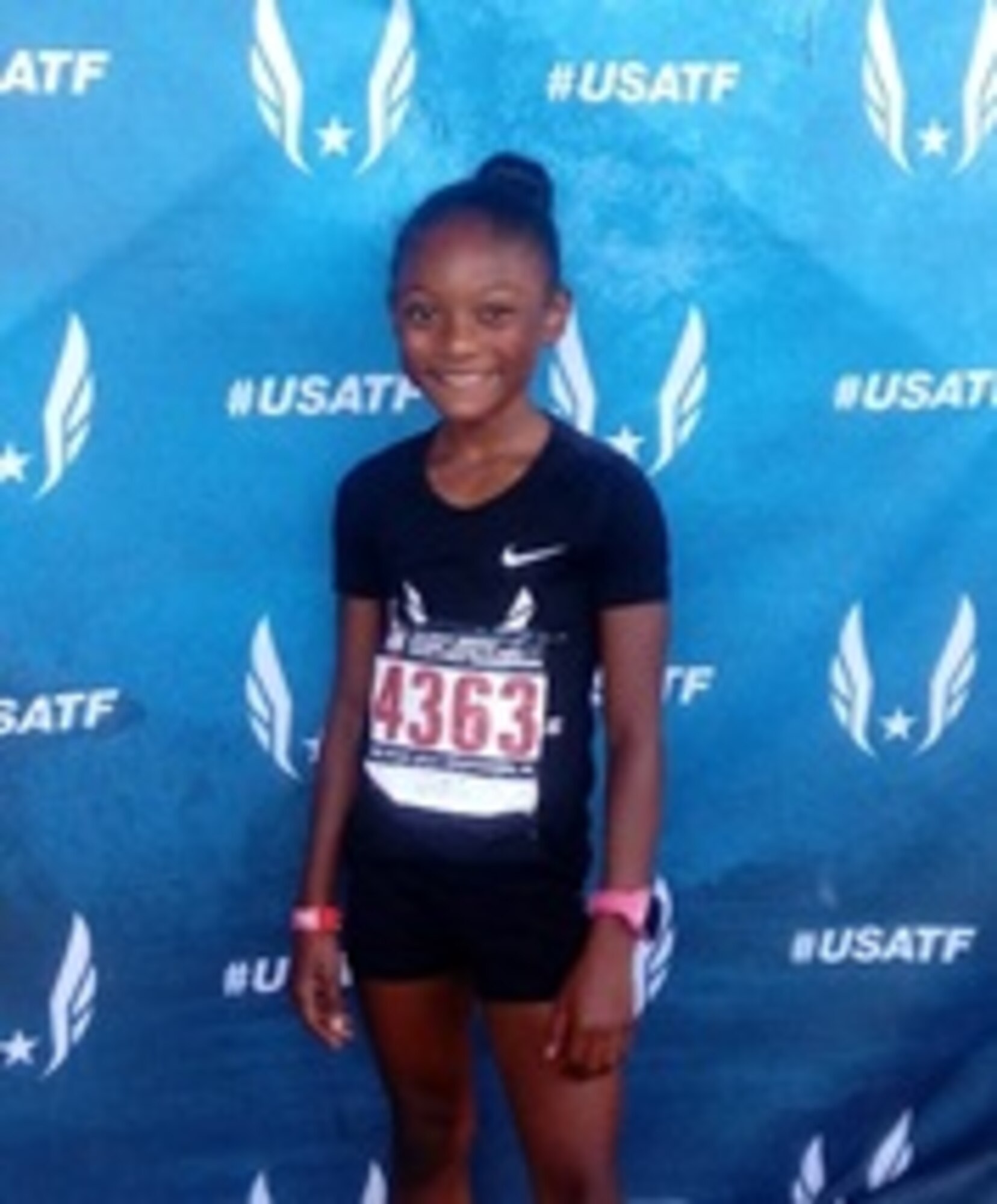 Jaiya Patillo, a Junior Olympian, poses for a photof at the 2018 USA Track & Field National Junior Olympics July 2018, at Greensboro, North Carolina. Patillo does much of her trtaining at Offutt Air Force Base. As of Sept. 21, 2018, her personal best times in her race categories were 14.32 seconds in the 100-meter, 28.53 seconds in the 200-meter, and 64.56 seconds in the 400-meter. (Courtesy Photo)