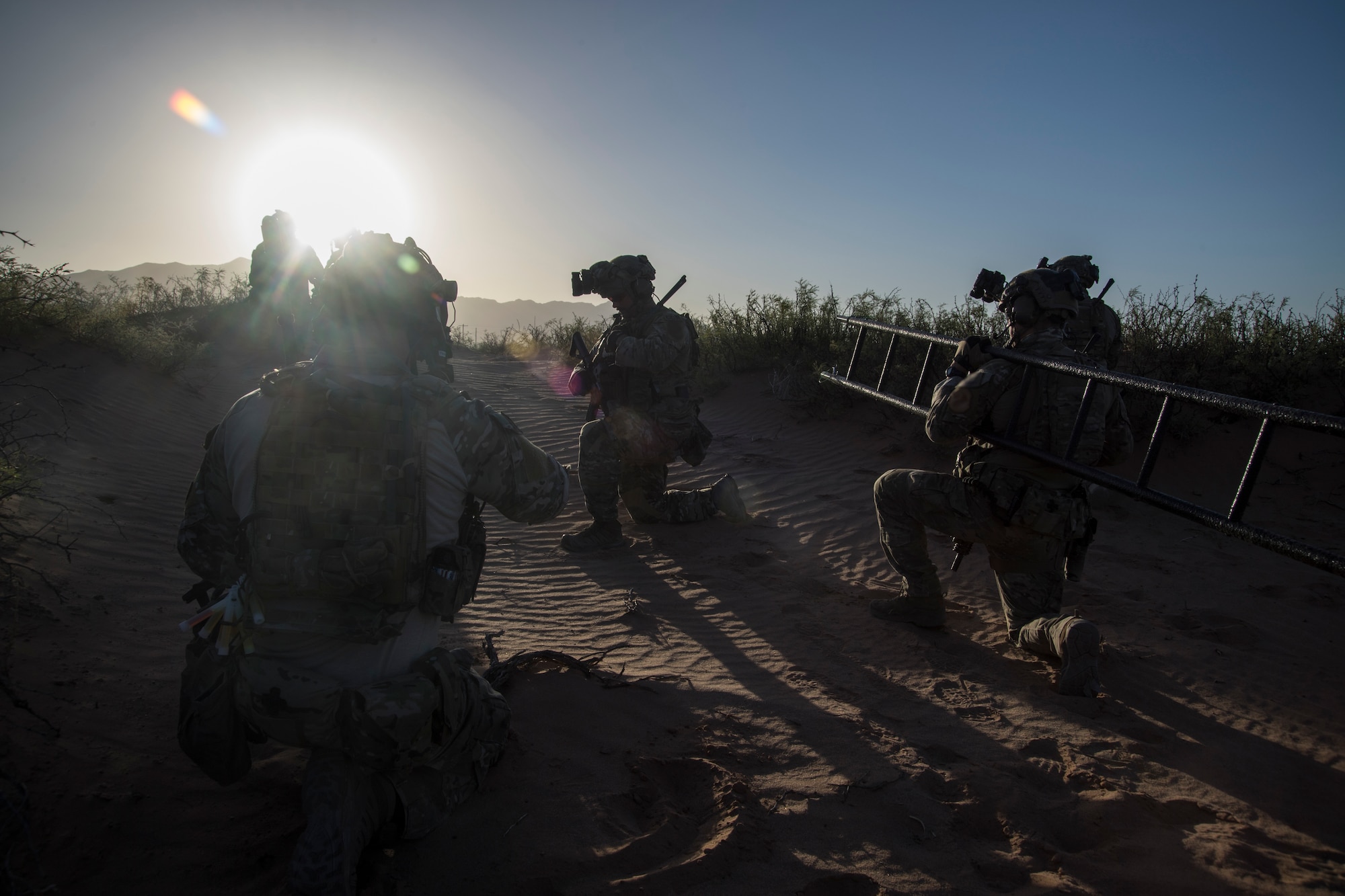 Special Tactics Airmen with the 21st Special Tactics Squadron prepare to infiltrate a compound at Fort Bliss, Texas, June 24, 2018.