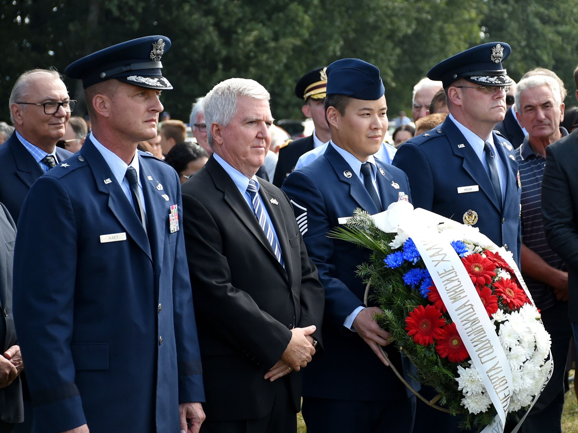Lined up from left to right, Brig. Gen. Todd M. Audet, Ohio Air National Guard Chief of Staff, Kyle Scott, U.S. Ambassador to Serbia, MSgt Ng, and Brig. Gen. Richard G. Moore Jr., U.S. Air Forces in Europe Chief of Staff, present a wreath at the Halyard Mission Commemoration in Pranjani, Serbia, Sept. 22, 2018. This is the 74th anniversary of the Halyard Mission, a WWII event in which local Serbian people sheltered 500 downed allied Airmen and enabled their rescue from enemy territory. (U.S. Air Force photo by TSgt Stephen Ocenosak)