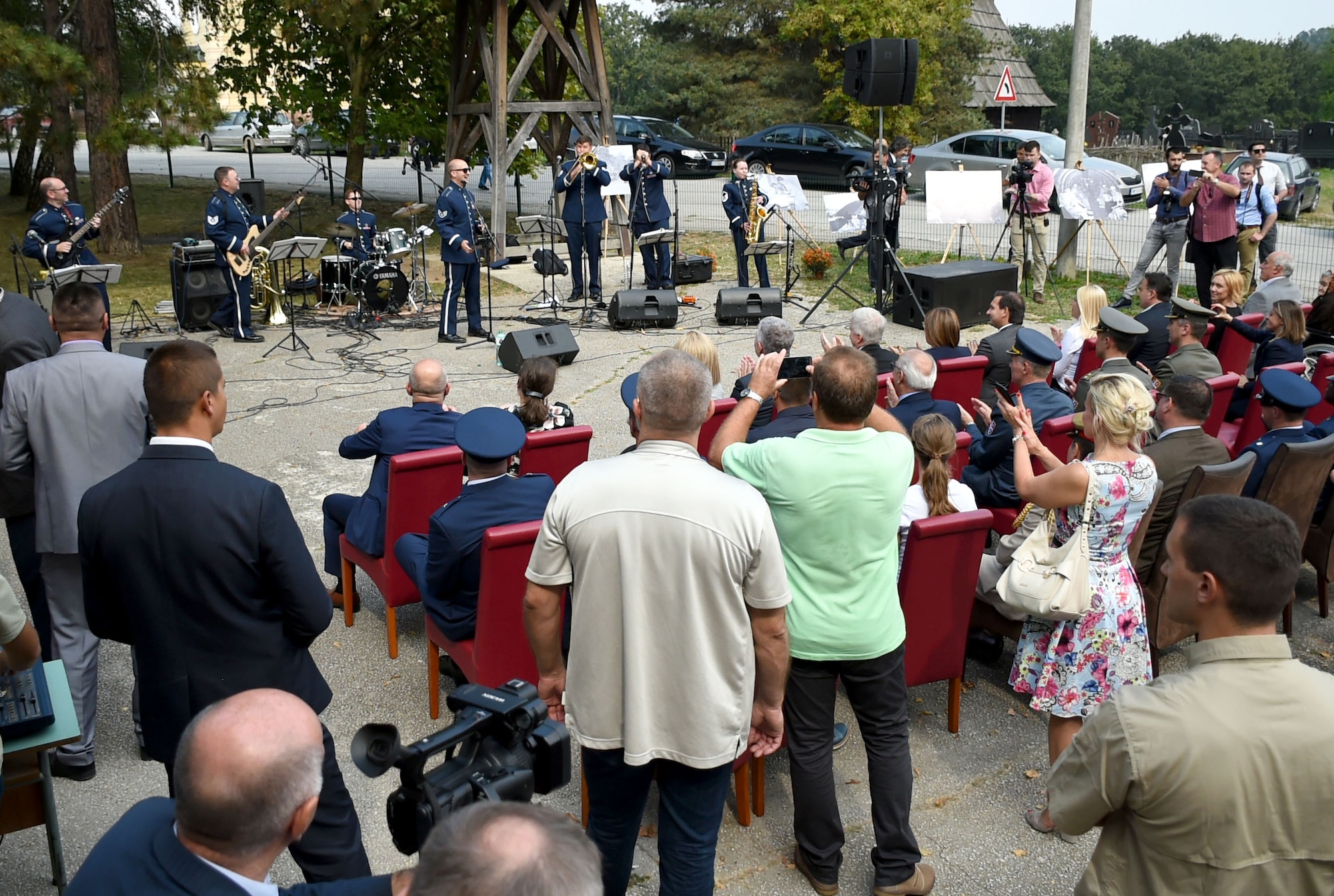 U.S. Air Forces in Europe Band performs outside the school in Pranjani, Serbia, Sept. 22, 2018, for the Halyard Mission Commemoration. The Halyard Mission was one of the largest evacuations of fallen allied airmen in occupied Europe during WWII. Pranjani and the nearby villages became the main collection center where rescued allied airmen were secretly transferred from all over Serbia. Almost every house in Pranjani hosted several airmen, providing them food and care. (U.S. Air Force photo by TSgt Stephen Ocenosak)