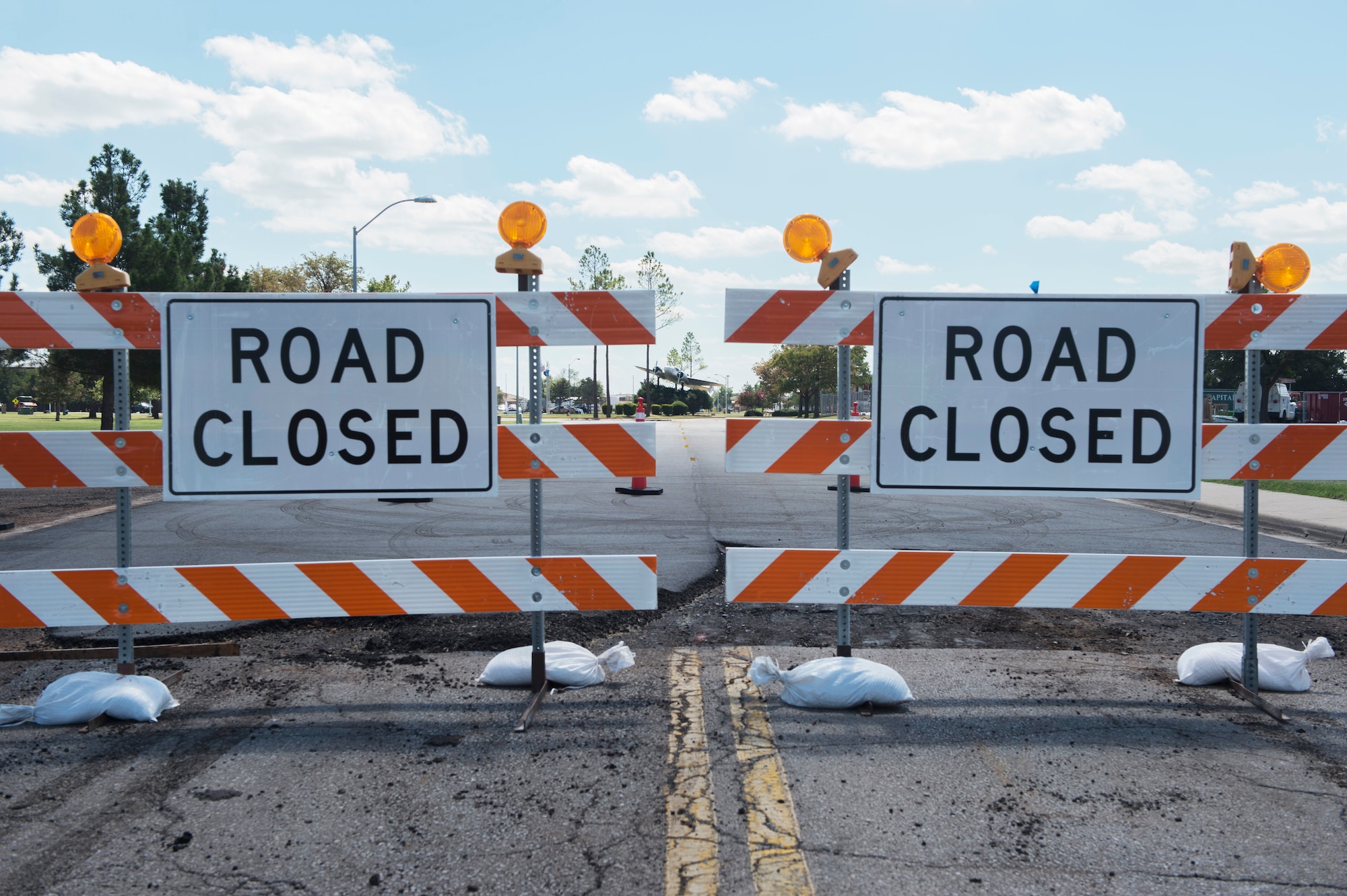 Warning signs alerts drivers to the closed roads around the traffic circle