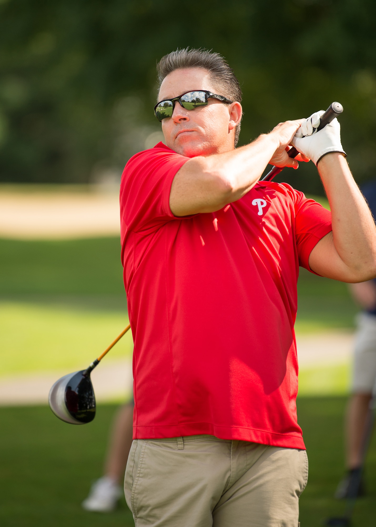 Tim Horne, Dover Motorsports, tees off during the Bluesuiters Golf Tournament Sept. 19, 2018, at the Eagle Creek Golf Course on Dover Air Force Base, Del. The biannual tournament also features raffles, door prizes and a lunch at the clubhouse.