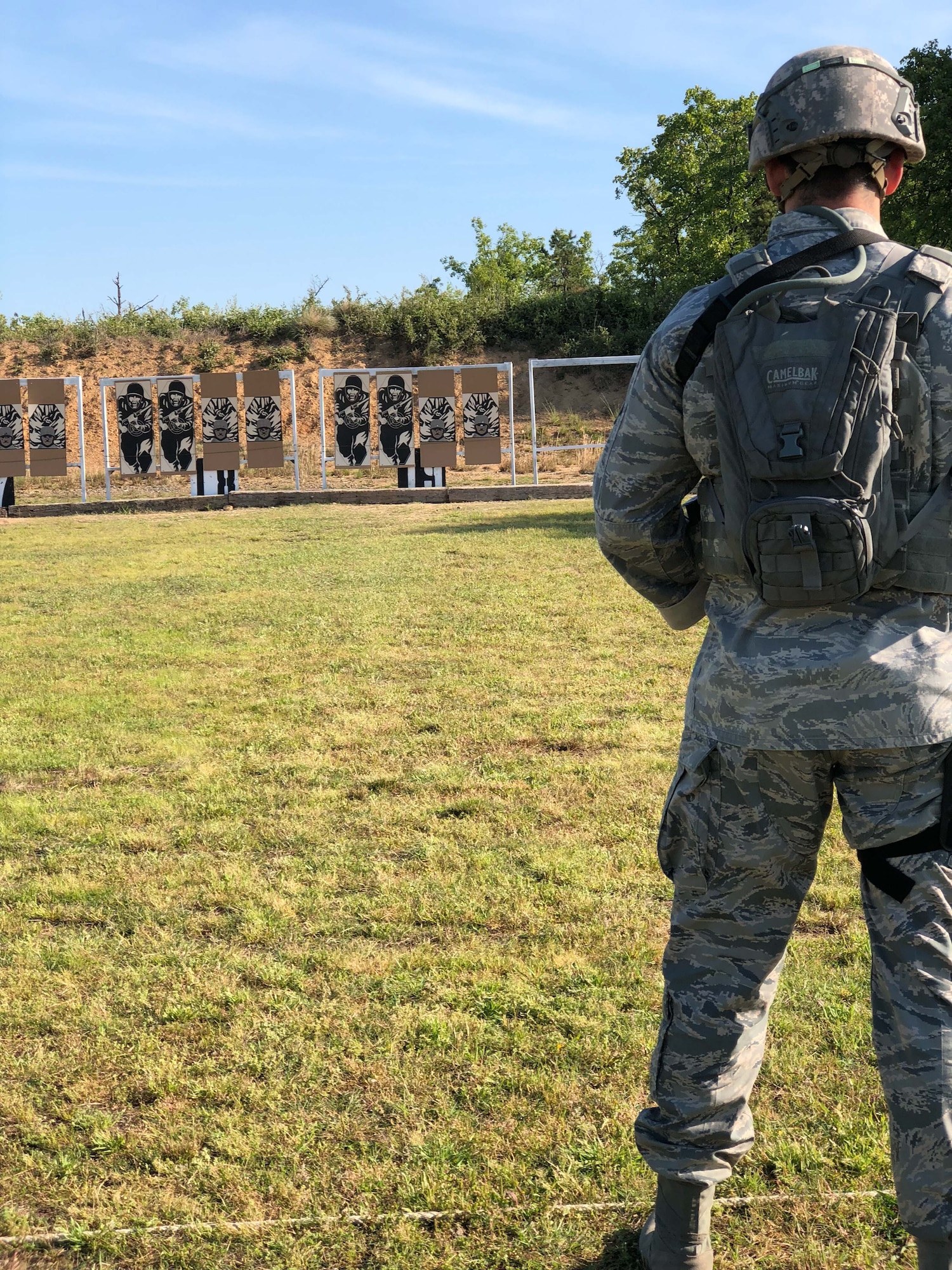 Staff Sgt. Caleb Gutting, 141st Security Forces Squadron, stands ready for the pistol Excellence in Competition match.  The 47th Annual Winston P. Wilson Championship, Robinson Maneuver Training Center, Arkansas, April 30, 2018.  The annual events, hosted by the National Guard Marksmanship Training Center April 29-May 4, 2018, offer Servicemembers from the National Guard and international community an opportunity to test marksmanship skills in a battle-focused environment. (U.S. Air National Guard photo by Staff Sgt. Hope Funderburk)