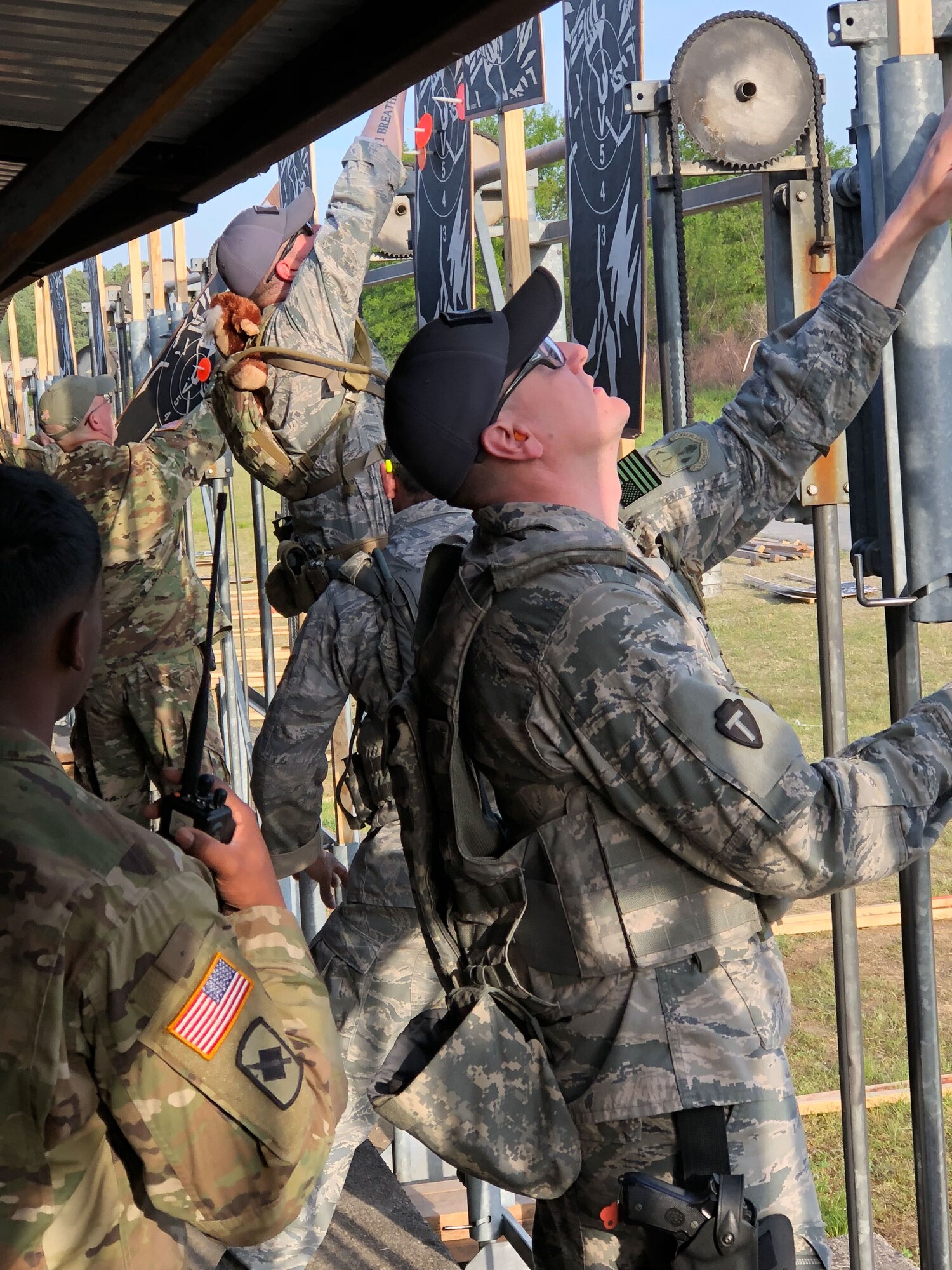Maj Eric Manewal, 194th Wing, marks targets in the pits during the 47th Annual Winston P. Wilson Championship, Robinson Maneuver Training Center, Arkansas, May 1, 2018.  The annual events, hosted by the National Guard Marksmanship Training Center April 29-May 4, 2018, offer Servicemembers from the National Guard and international community an opportunity to test marksmanship skills in a battle-focused environment. (U.S. Air National Guard photo by Staff Sgt. Hope Funderburk)