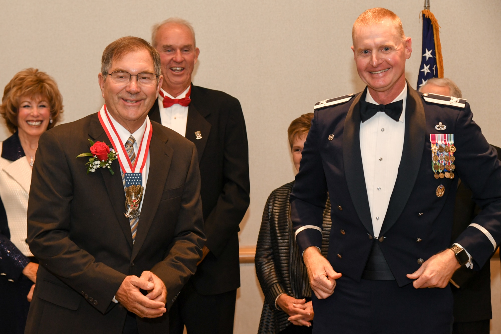 Bob Stevenson, Mayor of Layton City, Utah, receives the Hill Air Force Base Community Wingman Award from Col. Jon Eberlan, 75th Air Base Wing commander, at Hill's Air Force Ball Sept. 22. The annual honor recognizes a community member who has made a significant service contribution to the installation. (U.S. Air Force photo by Cynthia Griggs)