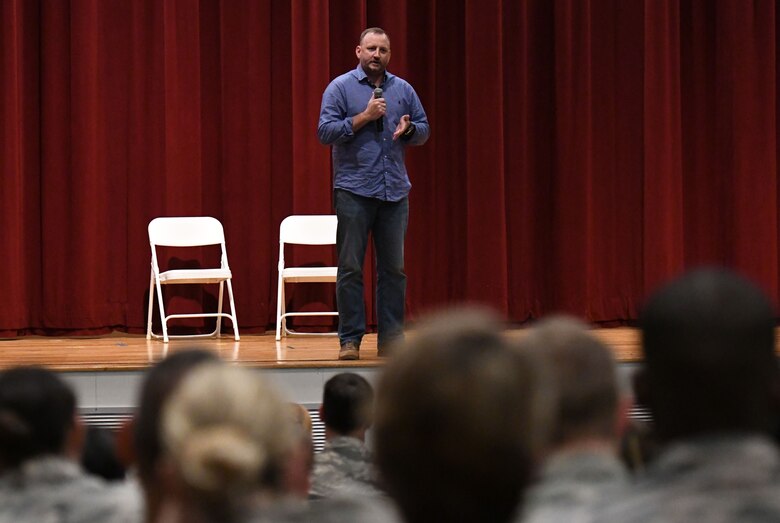 Retired U.S. Army Engineer Kenny Craig speaks during a 'Profiles in Courage' story-telling event at the Welch Theater at Keesler Air Force Base, Mississippi, Sept. 20, 2018. In recognition of suicide prevention and awareness month, military members shared their stories of bravery, strength and overcoming adversity with Keesler personnel. (U.S. Air Force photo by Kemberly Groue)