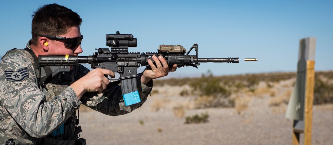 Staff Sgt. Matthew Gluyas, 99th Security Forces Squadron military working dog handler, fires an M4 carbine at a target at Nellis Air Force Base, Nevada, Sept. 19, 2018. The M4 is now the standard issue firearm for most units in the U.S. military. (U.S. Air Force photo by Airman 1st Class Andrew D. Sarver)